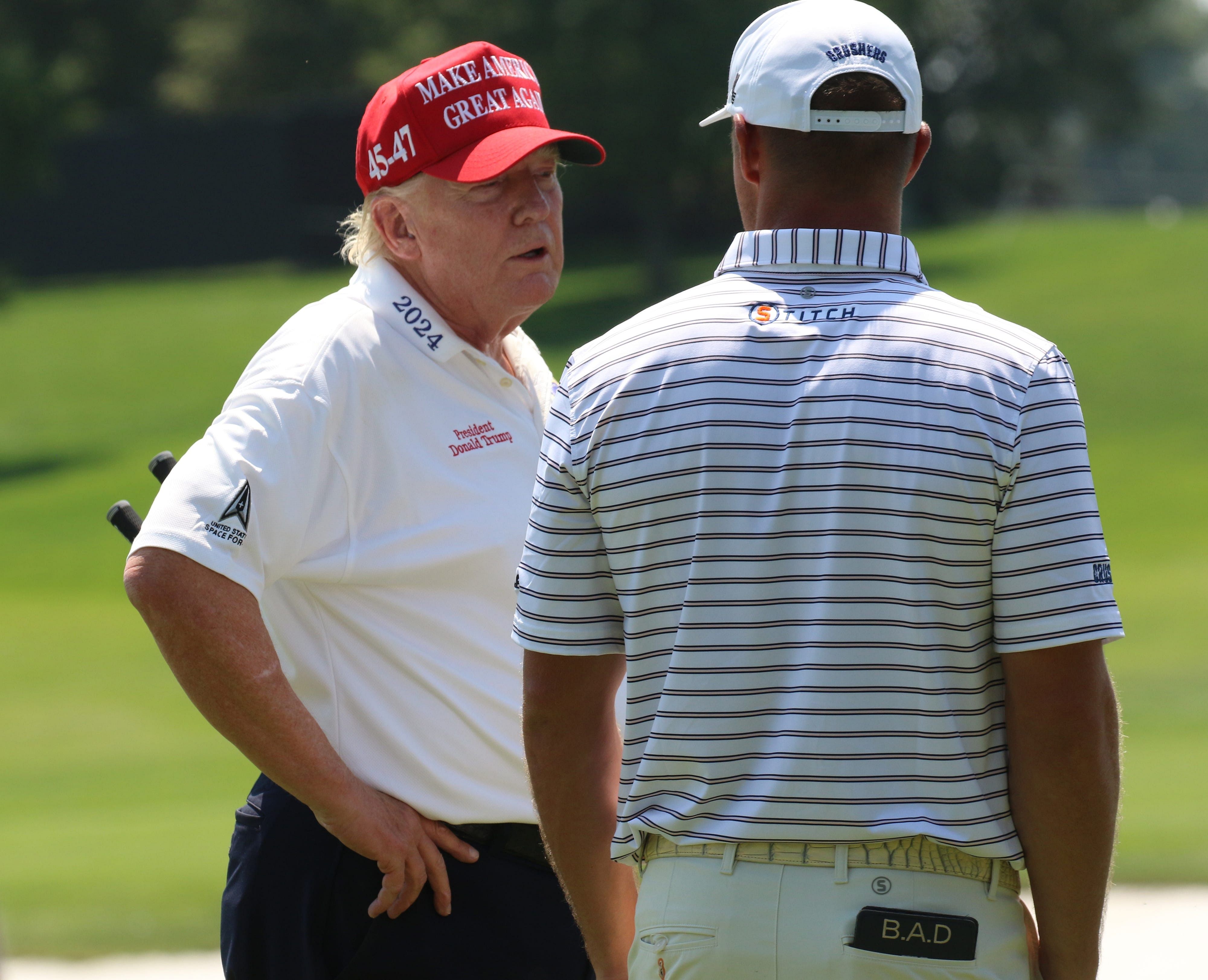  Donald Trump on the driving range as he played at Trump National in Bedminster before the LIV Golf Tournament, 2023 - Source: Imagn