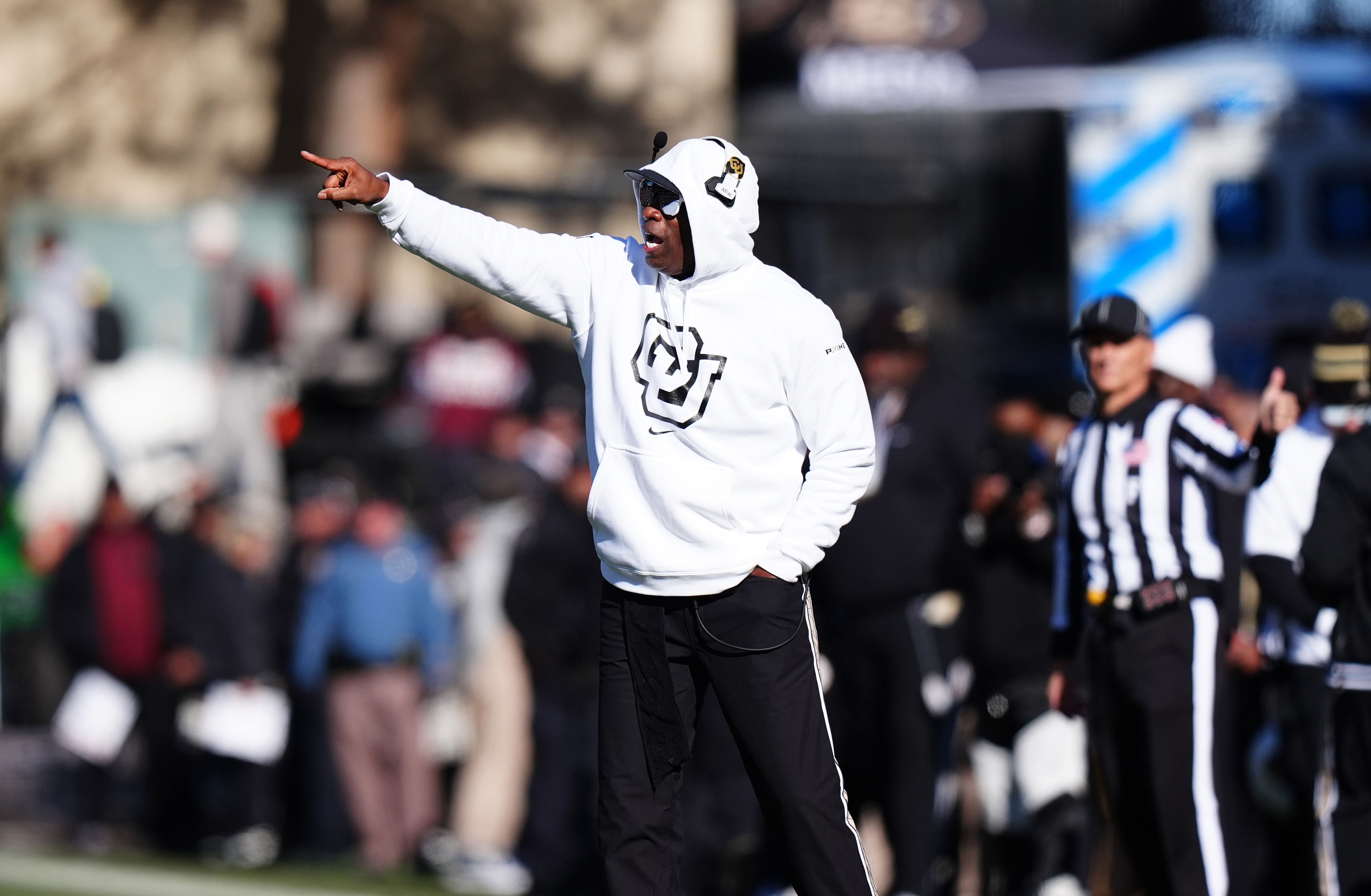 Colorado Buffaloes HC Deion Sanders gives instructions during an NCAA Football game. (Credits: IMAGN)