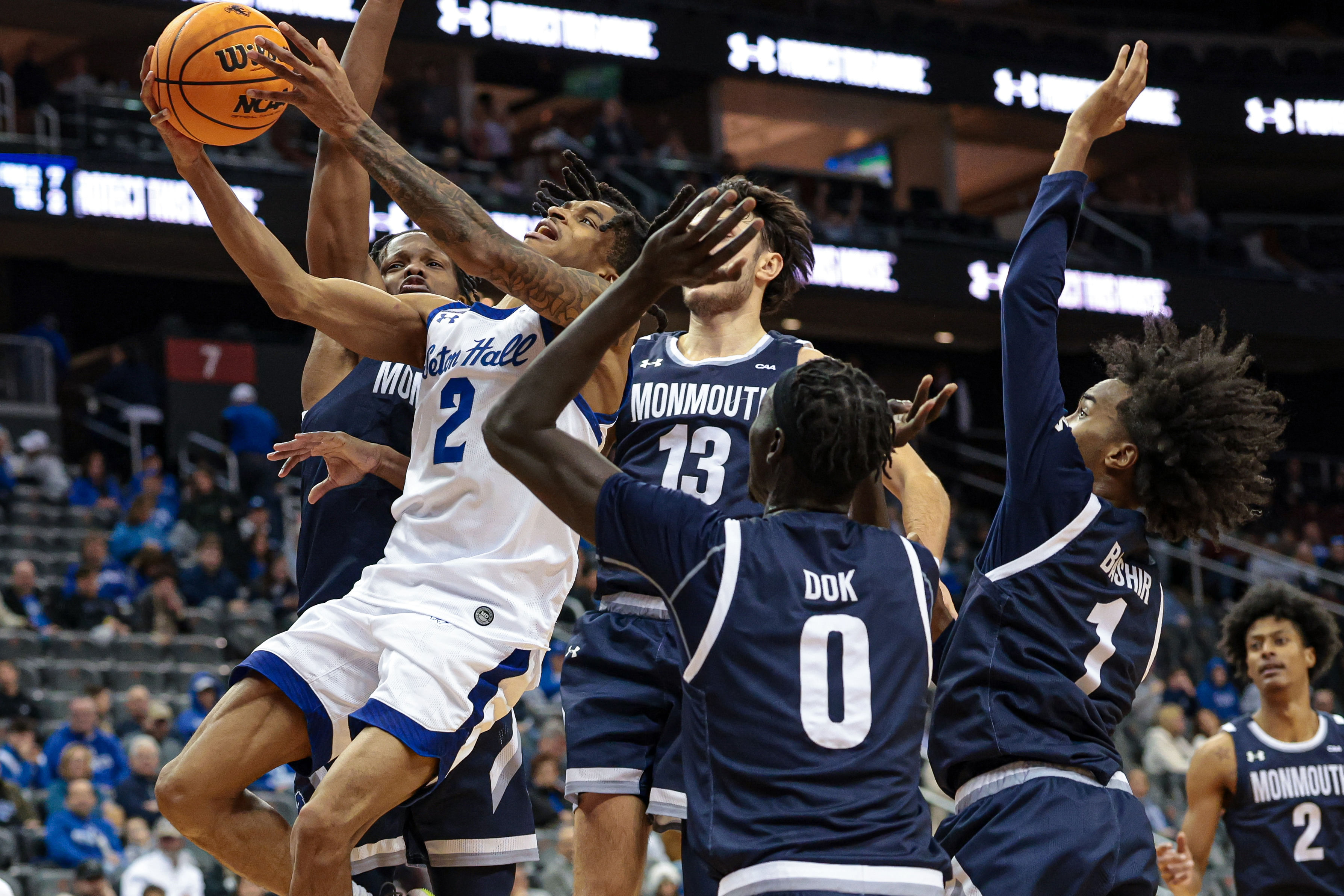 Seton Hall Pirates guard Chaunce Jenkins (2) drives to the basket against several Monmouth Hawks players during the second half of their game at Prudential Center. Photo: Imagn