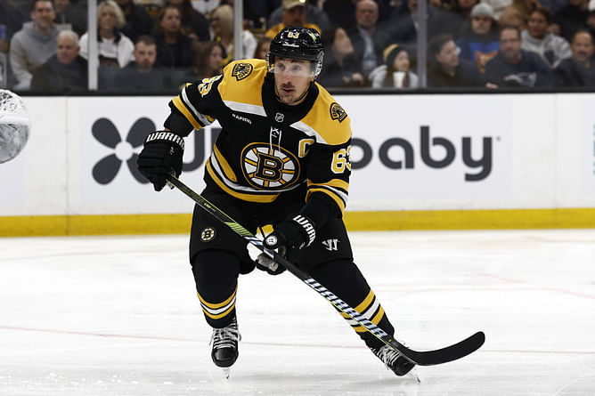 Brad Marchand makes his feelings known about being in the company of Bruins greats Orr, Esposito, others at Centennial ceremony