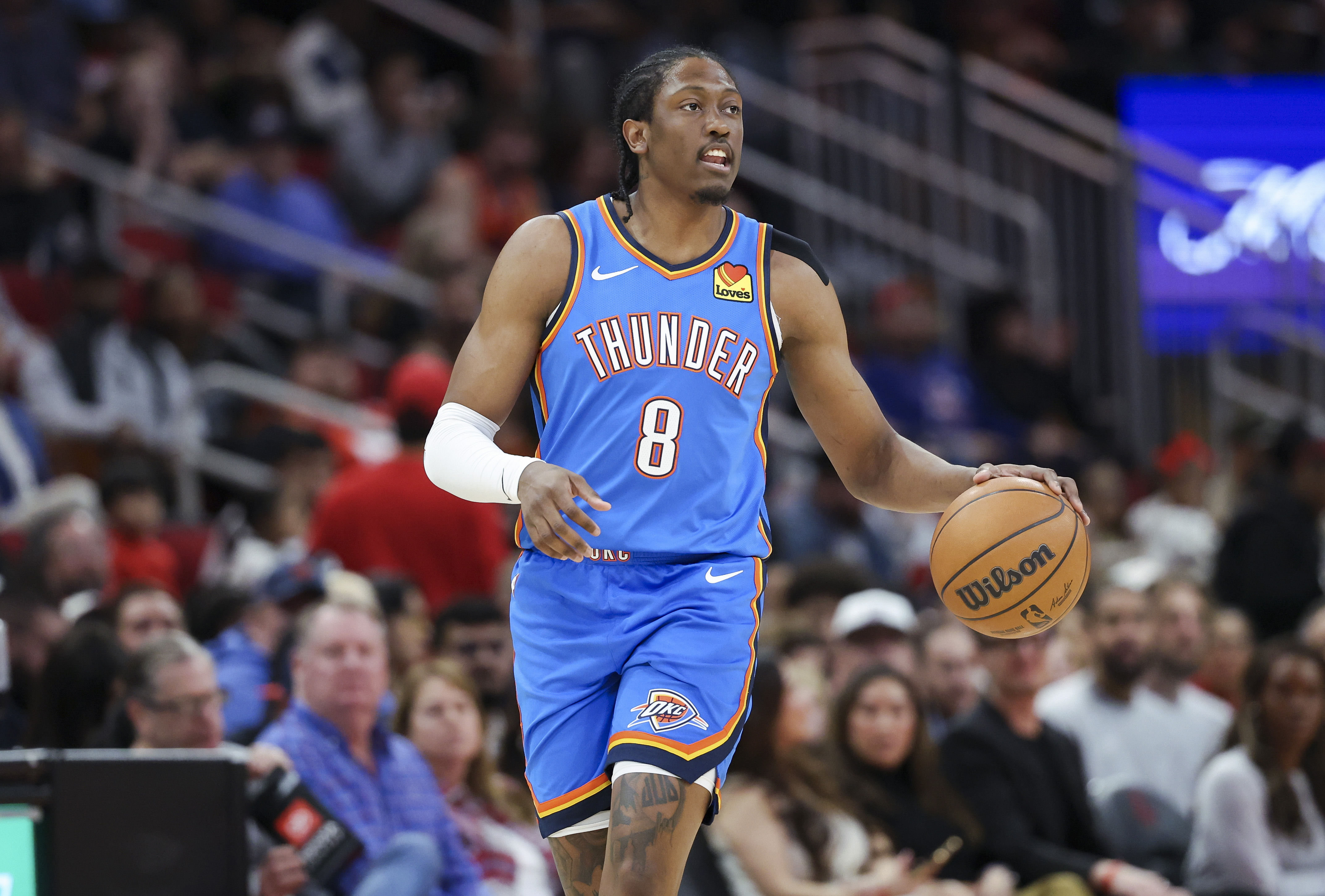 Oklahoma City Thunder forward Jalen Williams controls the ball during the game against the Houston Rockets at Toyota Center. Photo Credit: Imagn