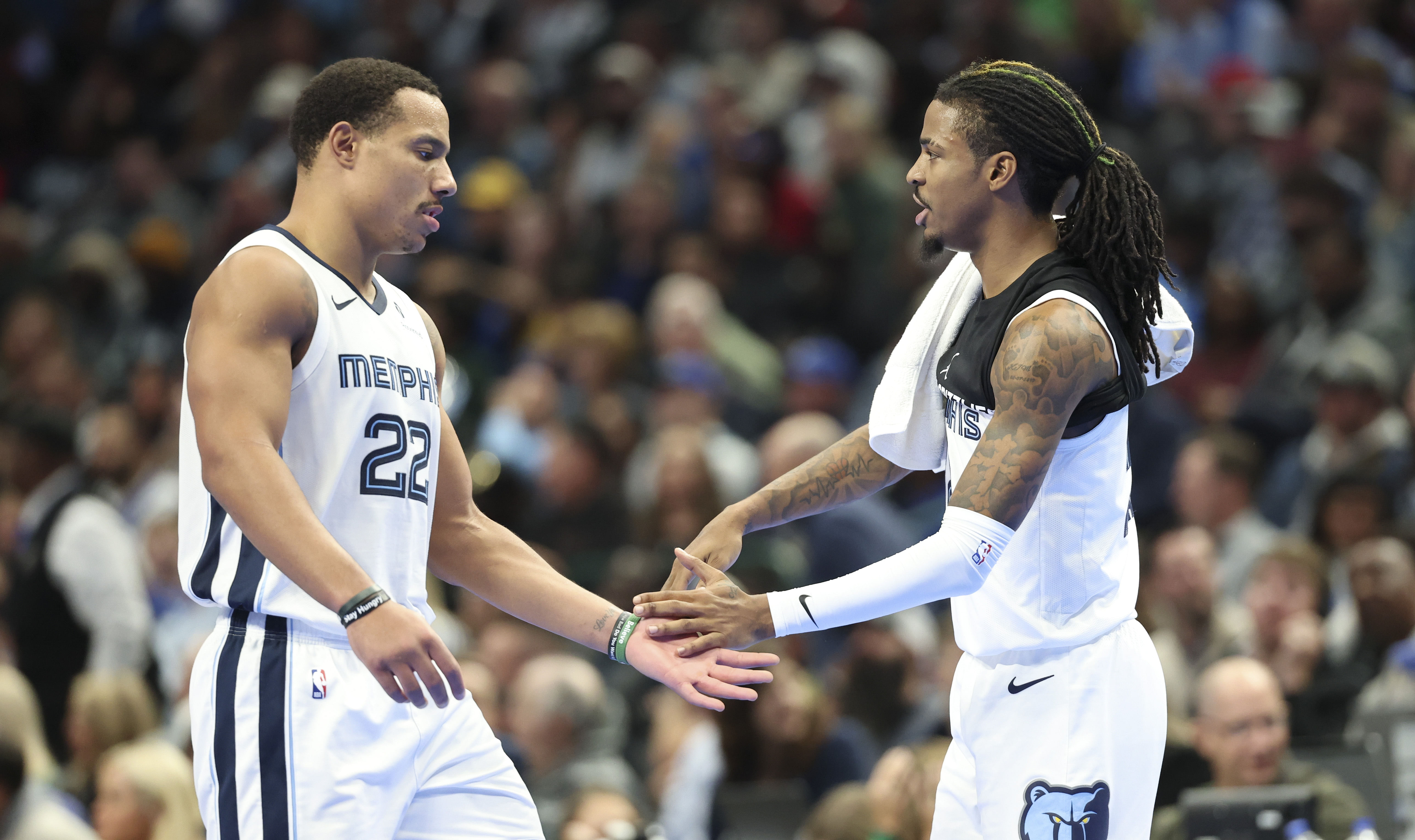 Memphis Grizzlies guard Ja Morant (12) celebrates with Memphis Grizzlies guard Desmond Bane (22) - Source: Imagn