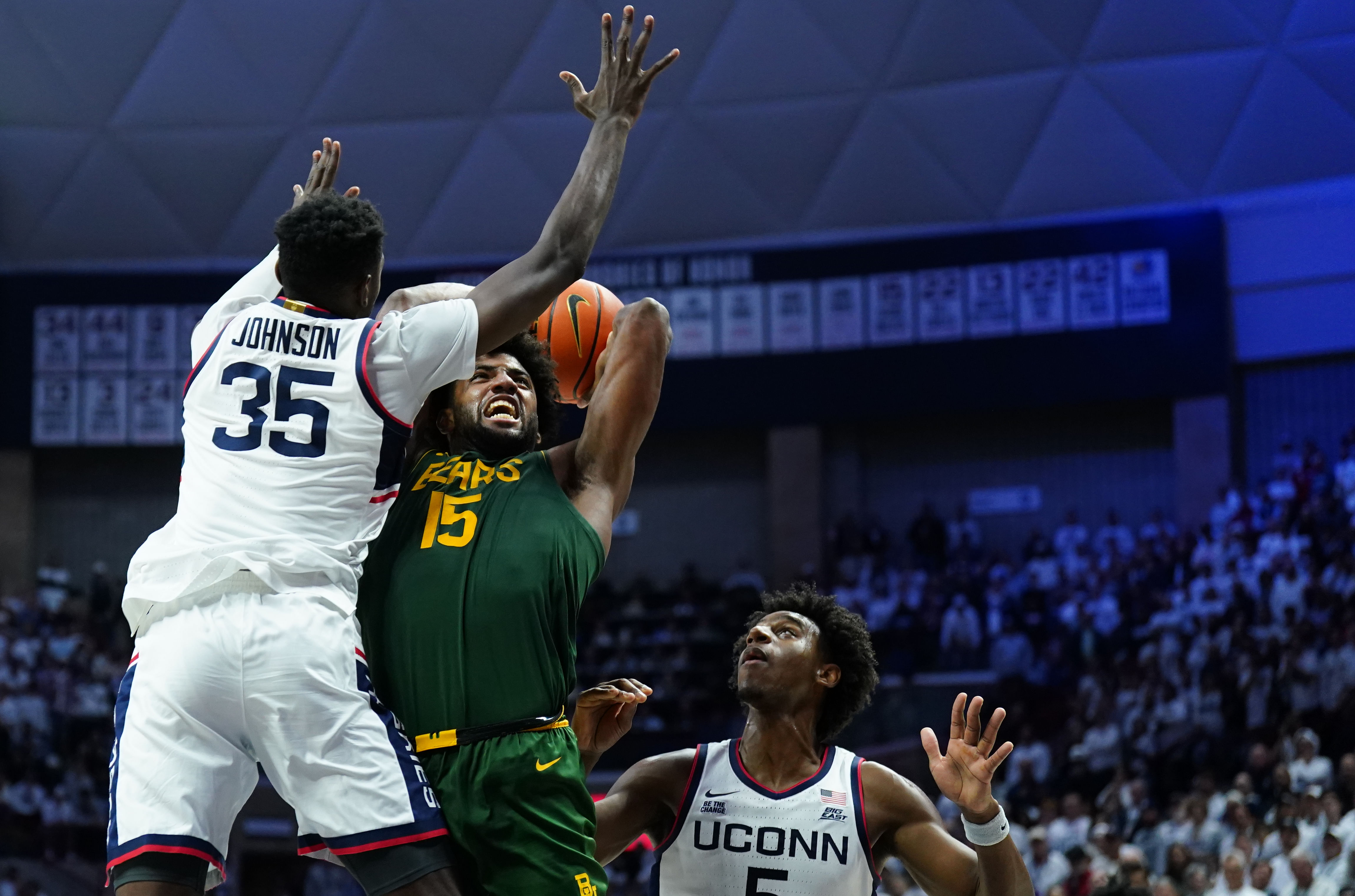 UConn&#039;s Tarris Reed Jr. and Samson Johnson (35) attempt to block a shot during an NCAA men&#039;s basketball game. (Credits: IMAGN)