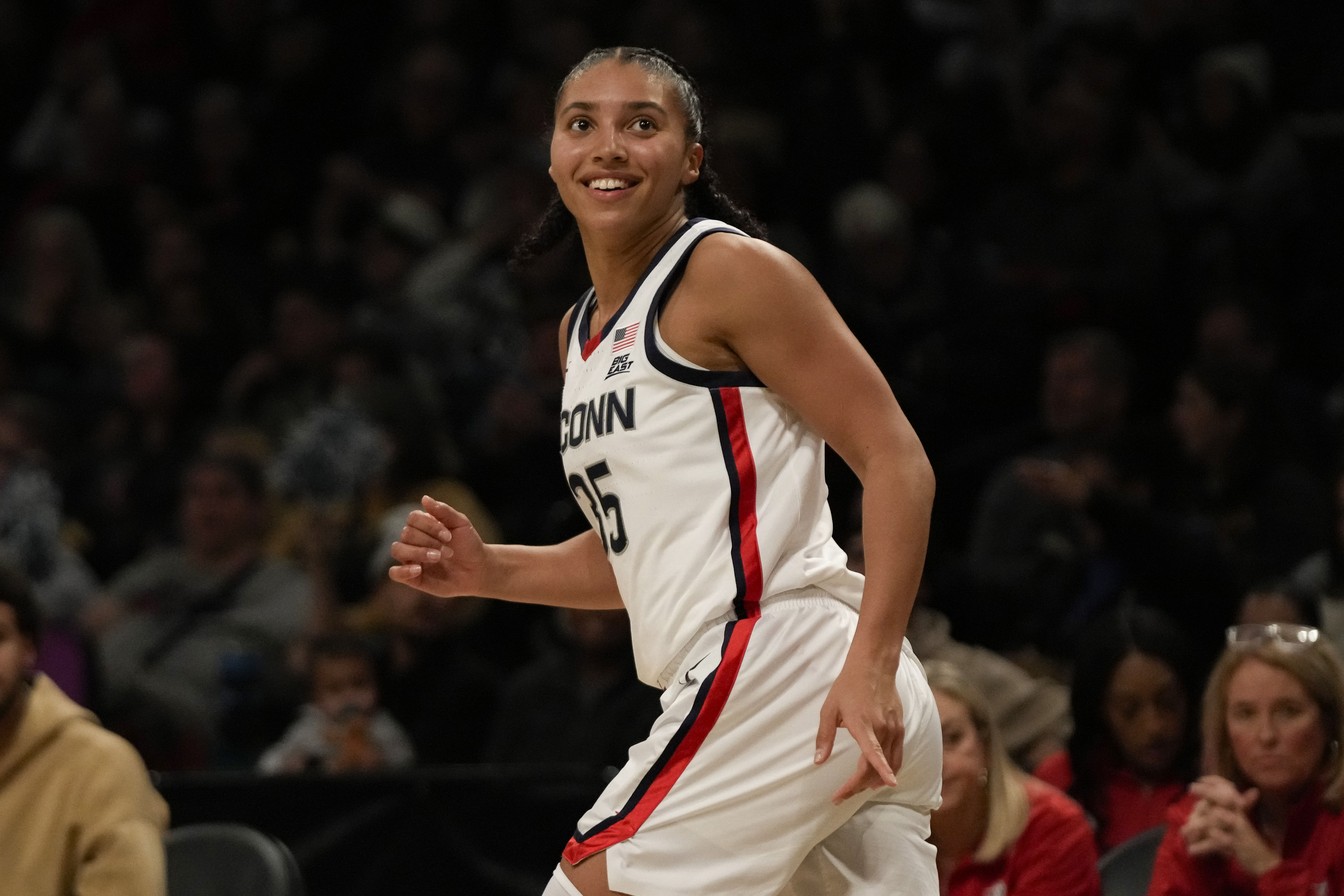 Connecticut Huskies guard Azzi Fudd (35) reacts after scoring a three-pointer during the first half against the Louisville Cardinals at Barclays Center. Photo: Imagn