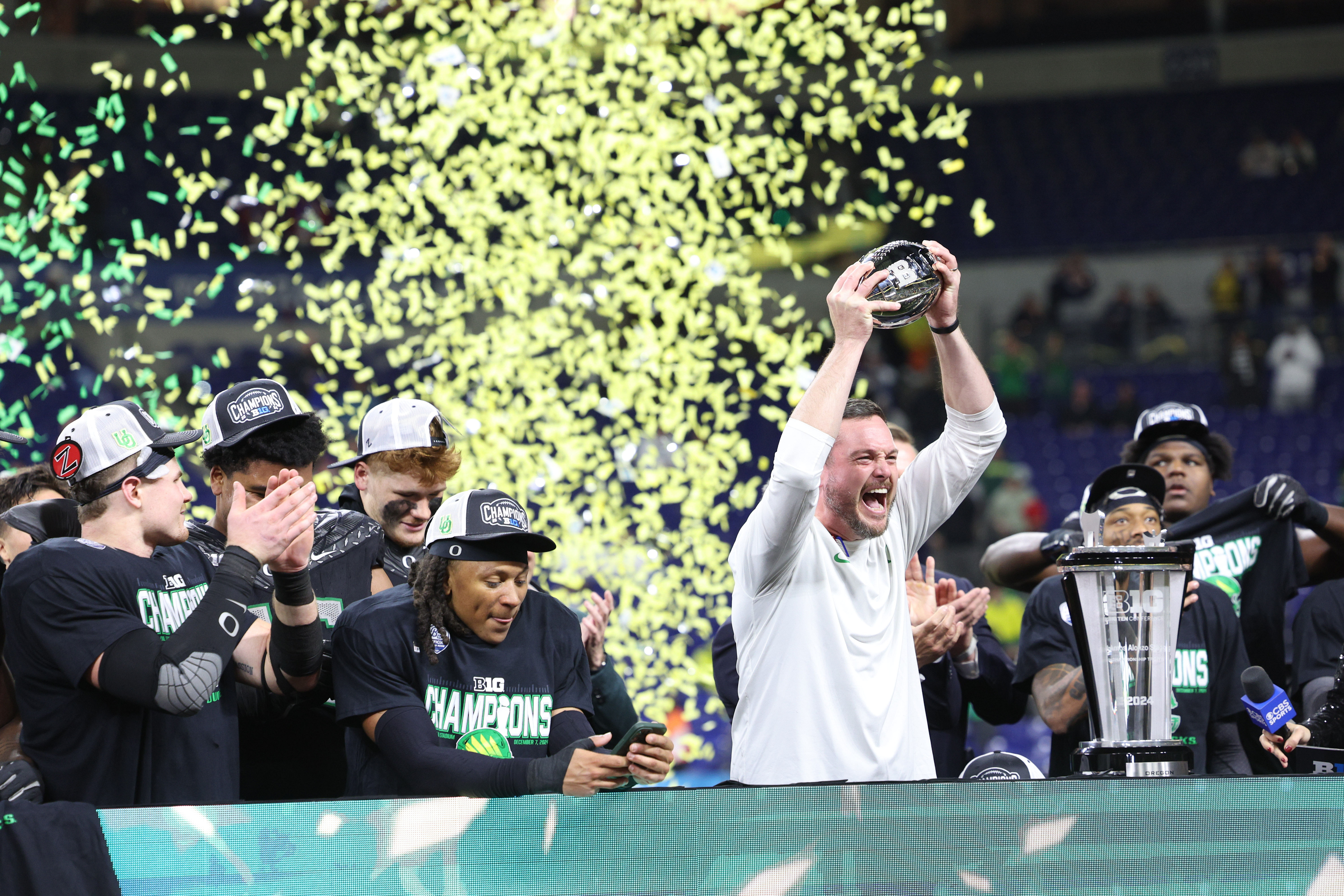 HC Dan Lanning celebrates the Big Ten Title  - Source: Imagn