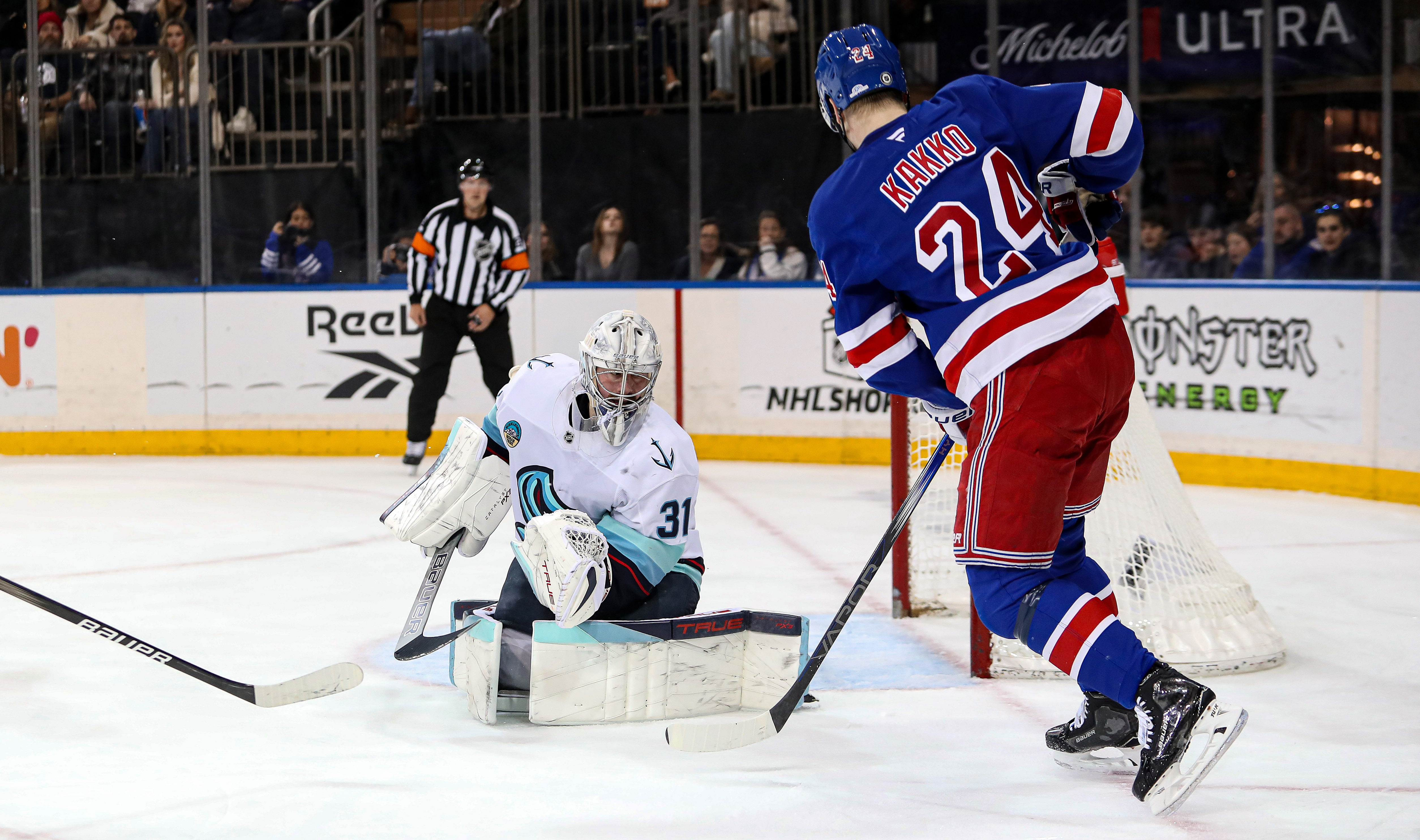 New York Rangers right wing Kaapo Kakko (24) attempts to score past Seattle Kraken goalie Philipp Grubauer (31). (Credits: IMAGN)