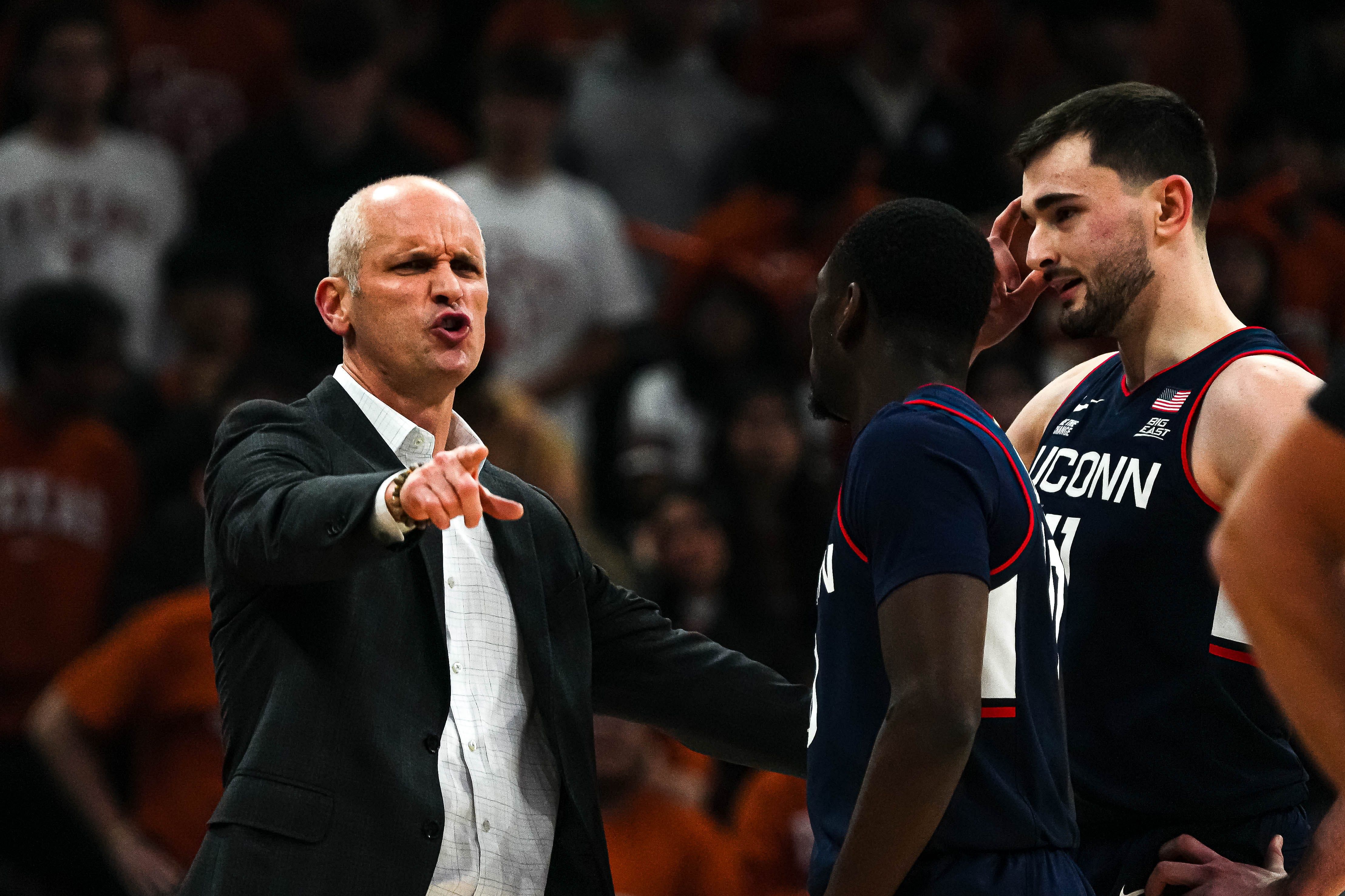 University of Connecticut head coach Dan Hurley talks to guard Hassan Diarra (#10) and forward Alex Karaban (#11) during the game against the &lt;a href=&#039;https://www.sportskeeda.com/college-basketball/texas-longhorns&#039; target=&#039;_blank&#039; rel=&#039;noopener noreferrer&#039;&gt;Texas Longhorns&lt;/a&gt; at the Moody Center. Photo: Imagn