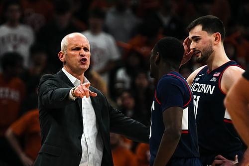 University of Connecticut head coach Dan Hurley talks to guard Hassan Diarra (#10) and forward Alex Karaban (#11) during the game against the Texas Longhorns at the Moody Center. Photo: Imagn