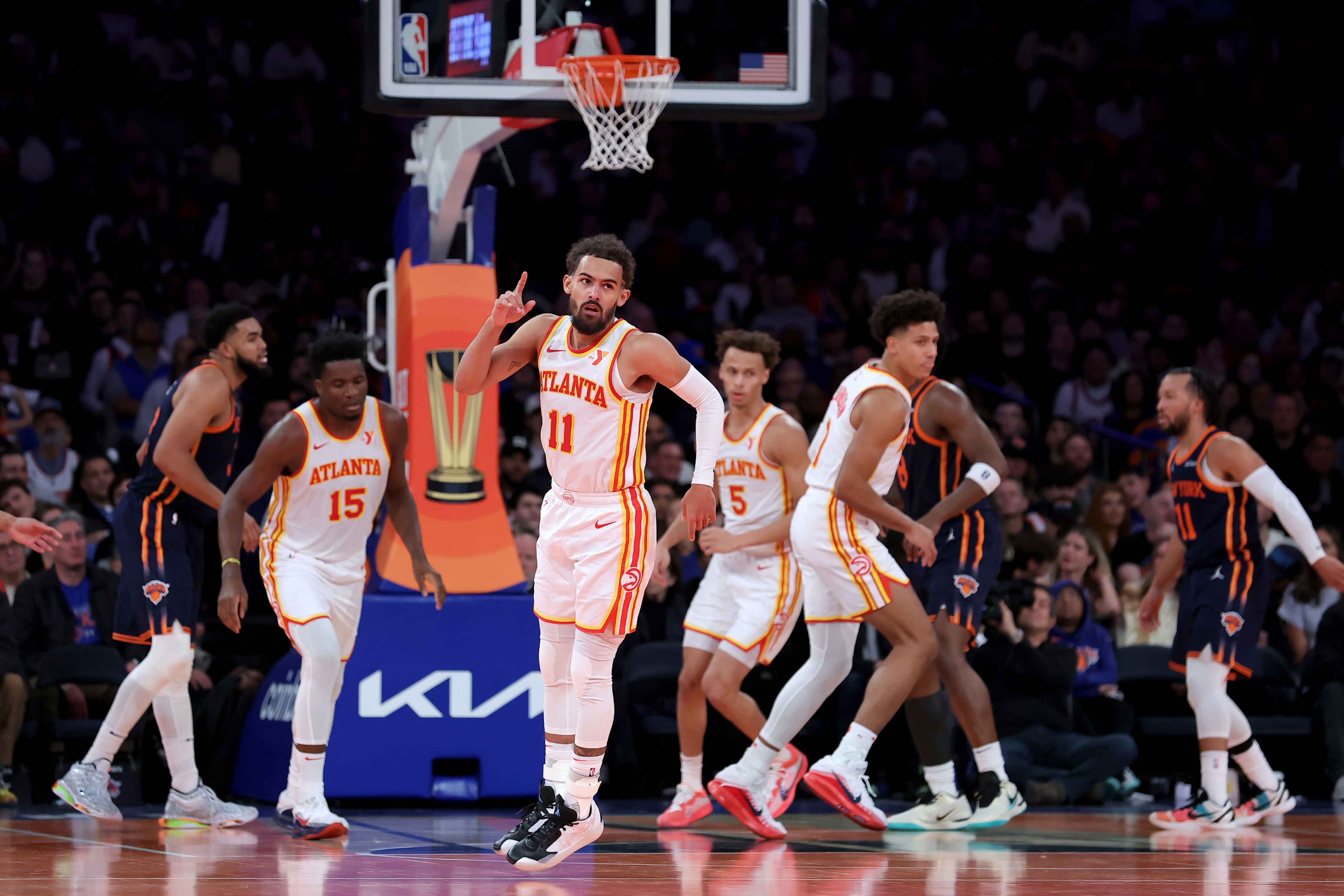 Atlanta Hawks guard Trae Young (11) celebrates his three-point shot against the New York Knicks - Source: Imagn