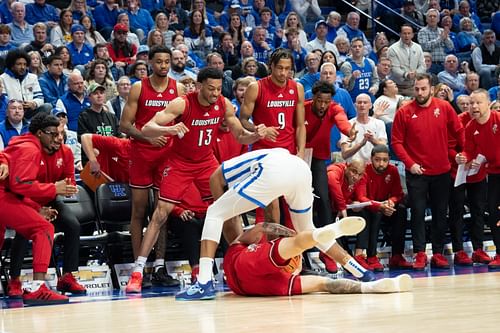 Kentucky Wildcats forward Brandon Garrison (10) fights for the loose ball in front of the Louisville Cardinals bench during their game on Saturday, Dec. 14, 2024 at Rupp Arena. Photo: Imagn