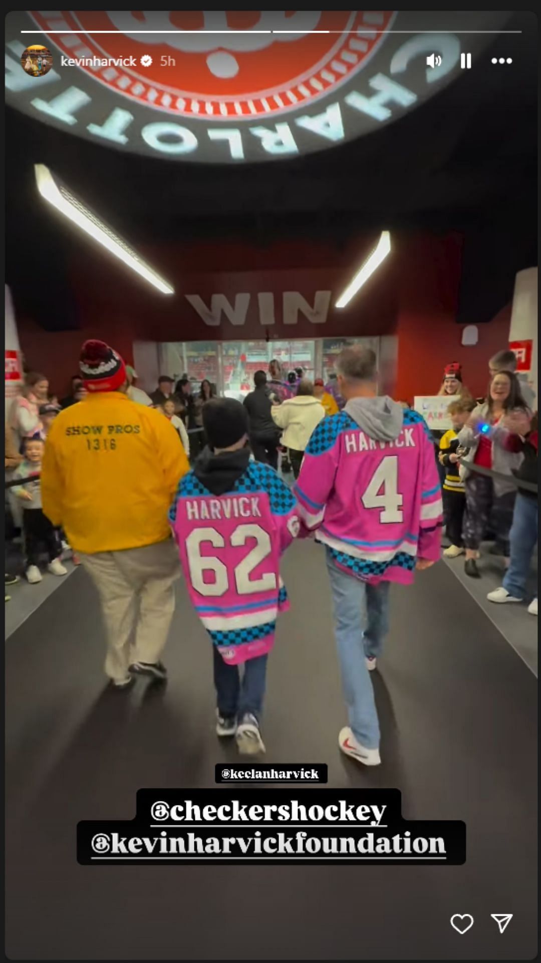 Kevin Harvick with his son Keelan at the Charlotte Checkers game - Source: @kevinharvick on Instagram