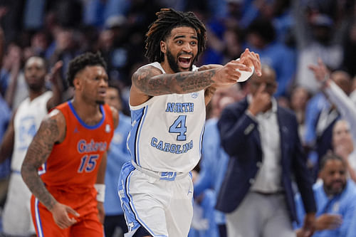 North Carolina Tar Heels guard RJ Davis (#4) reacts to his three-point play against the Florida Gators during the second half of their NCAA game at Spectrum Center. Photo: Imagn