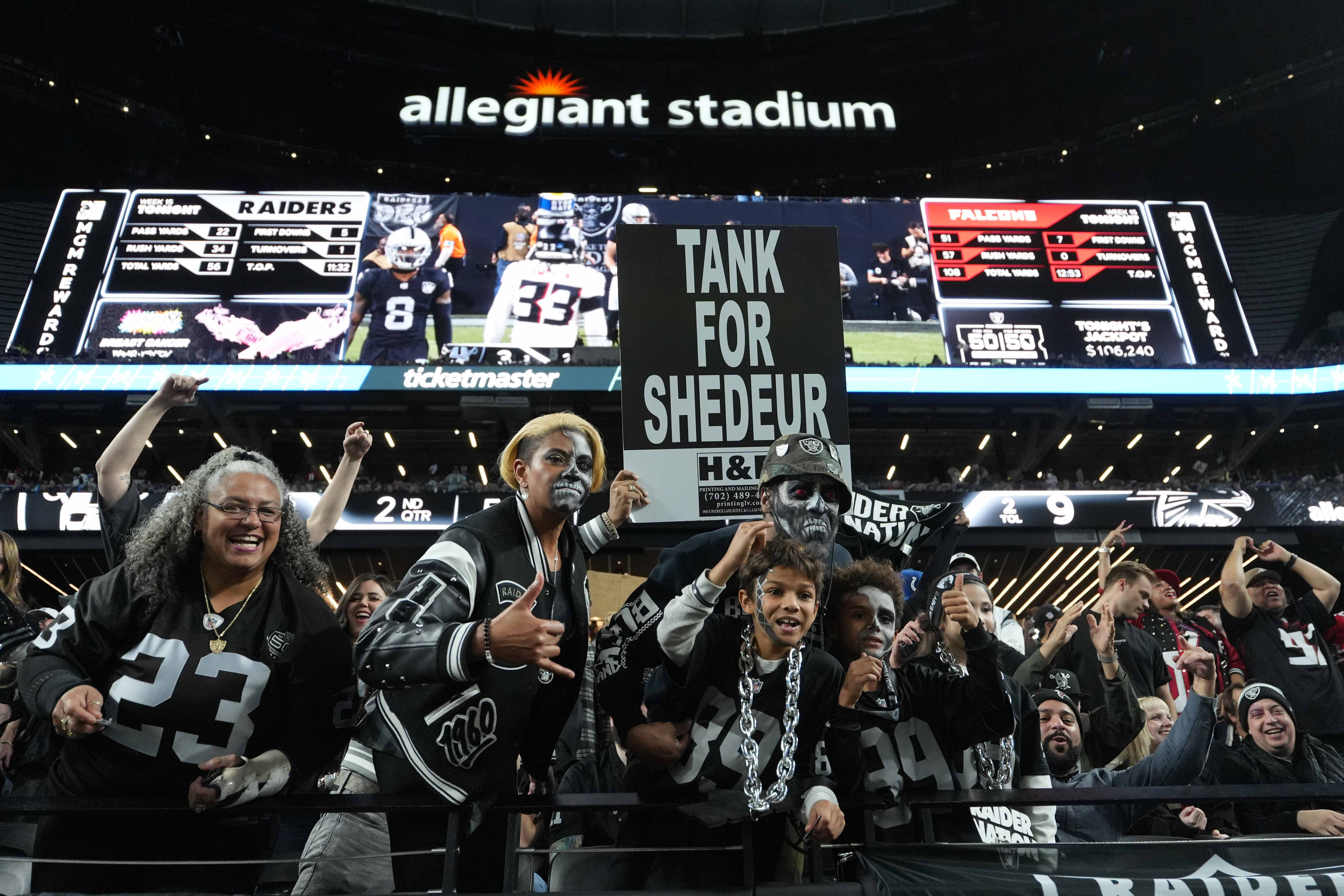 Las Vegas Raiders fans hold a sign that reads Tank for Shedeur Sanders during the game against the Atlanta Falcons - Source: Imagn