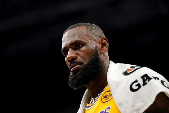 "The PED abuse is crazy" - NBA fans react to LeBron James caught popping pill courtside during Lakers game
