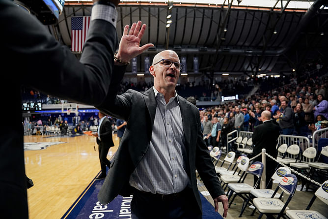 Dan Hurley’s wife Andrea shares Christmas card with pictures from 2024 NCAA title, walk with Joe Biden at White House and more