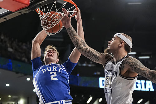 Duke Blue Devils guard Cooper Flagg (#2) dunks behind Georgia Tech Yellow Jackets forward Duncan Powell (#31) during the first half at McCamish Pavilion. Photo: Imagn