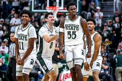 Michigan State's Coen Carr, center, celebrates with his teammates after scoring a 3-pointer against Florida Atlantic during the second half on Saturday, Dec. 21, 2024, in East Lansing. Photo: Imagn