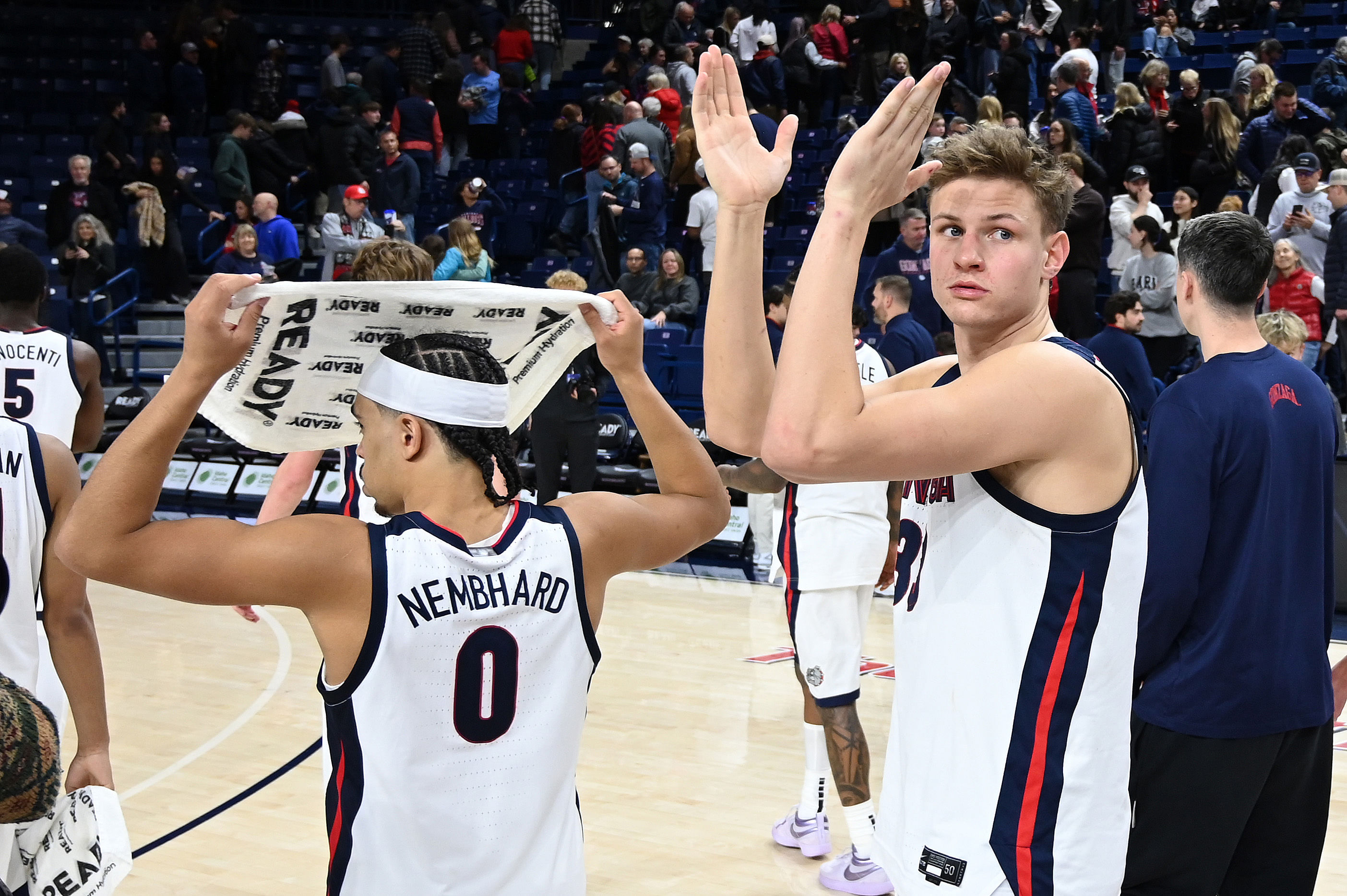 Gonzaga Bulldogs forward Ben Gregg (#33) and guard Ryan Nembhard (#0) walk off the court after their game against the Bucknell Bison at McCarthey Athletic Center. Photo: Imagn