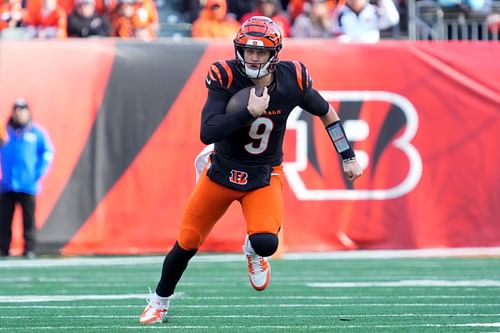 Cincinnati Bengals quarterback Joe Burrow (9) runs for a first down in the second quarter of the NFL Week 16 game between the Cincinnati Bengals and the Cleveland Browns. (Credits: IMAGN)