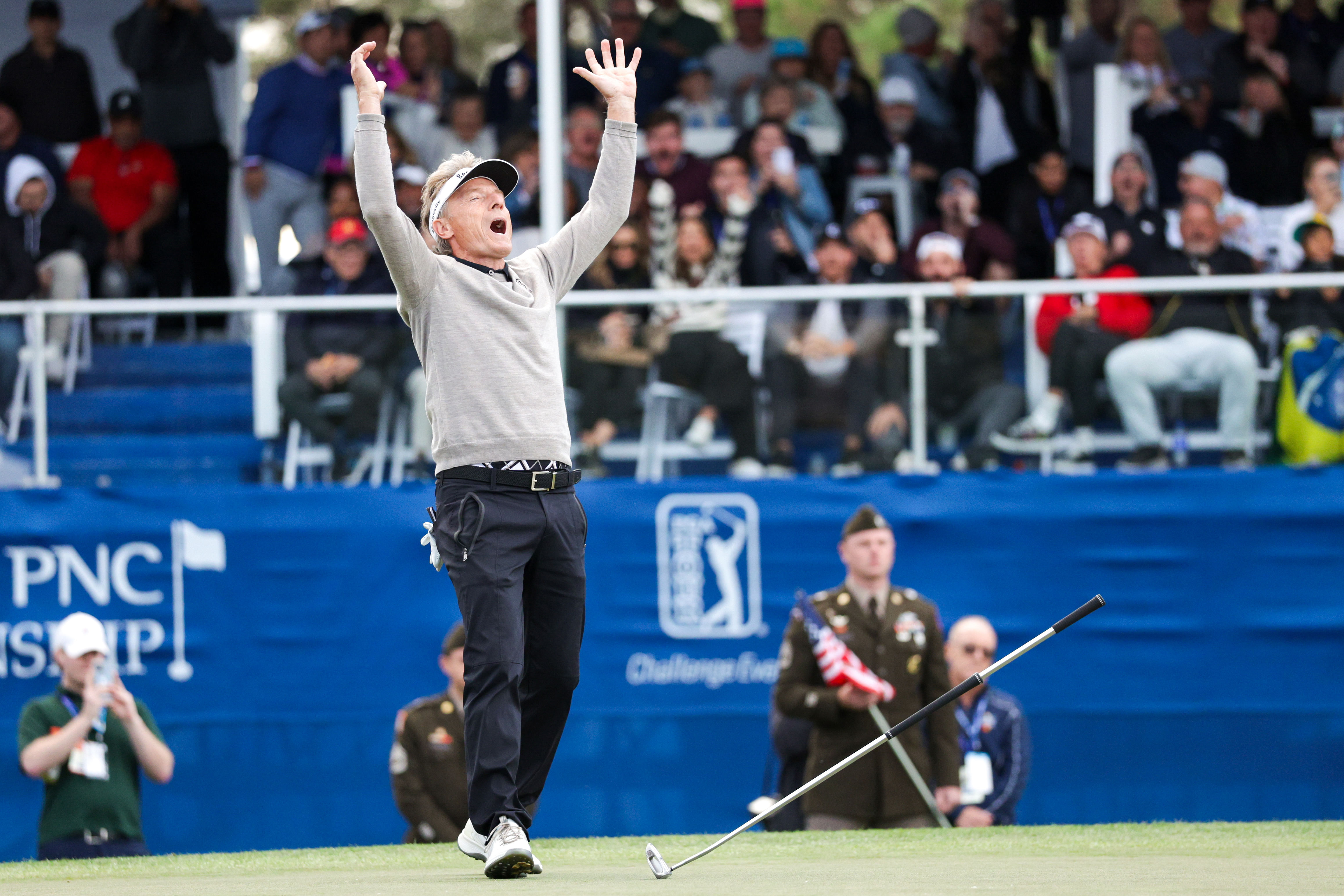 Bernhard Langer celebrates after hitting the winning putt in a playoff hole to win the PNC Championship (Image Source: Imagn)