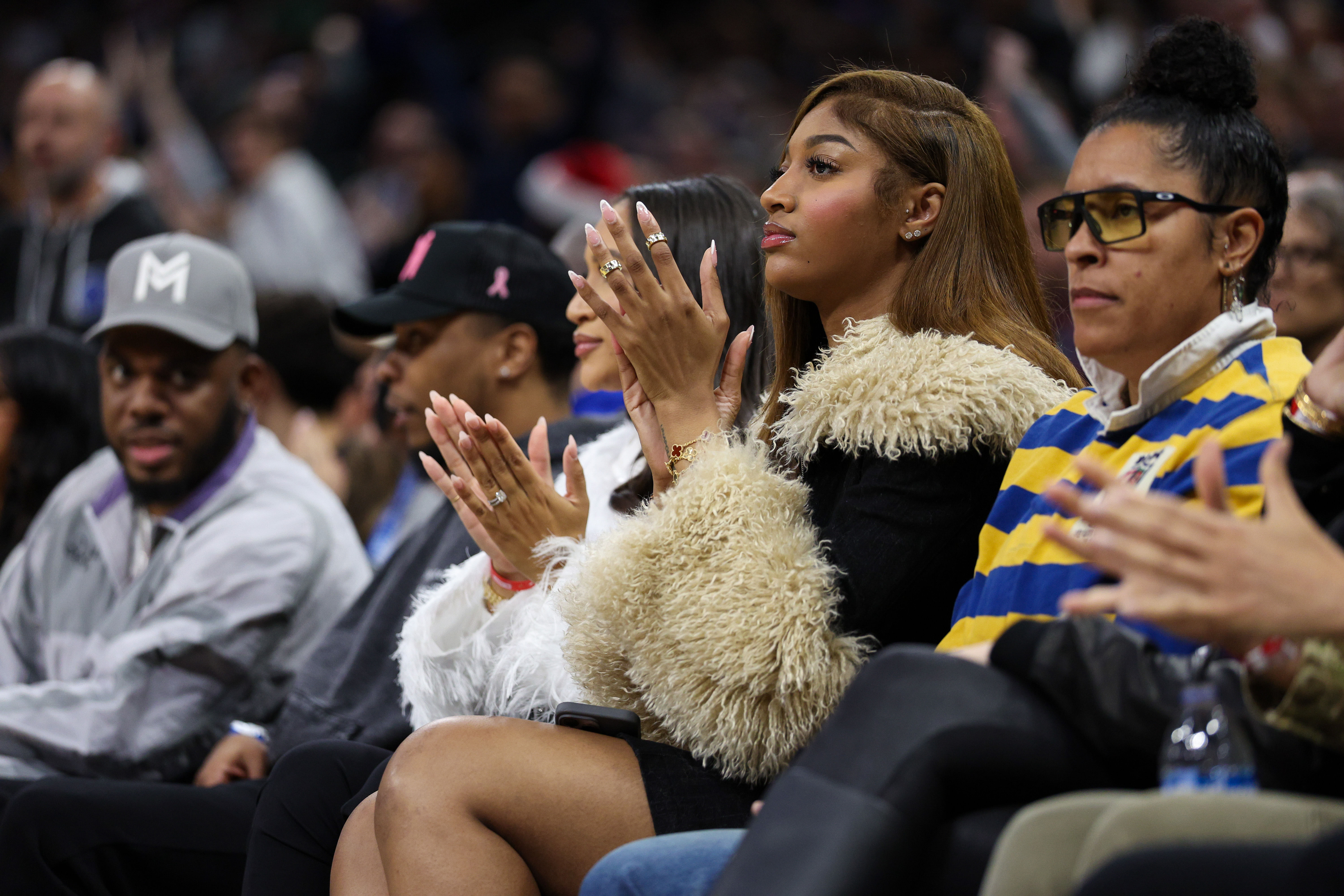 Dec 23, 2024; Orlando, Florida, USA; Chicago Sky forward Angel Reese attends a NBA game between the Boston Celtics and Orlando Magic at Kia Center. Mandatory Credit: Nathan Ray Seebeck-Imagn Images - Source: Imagn