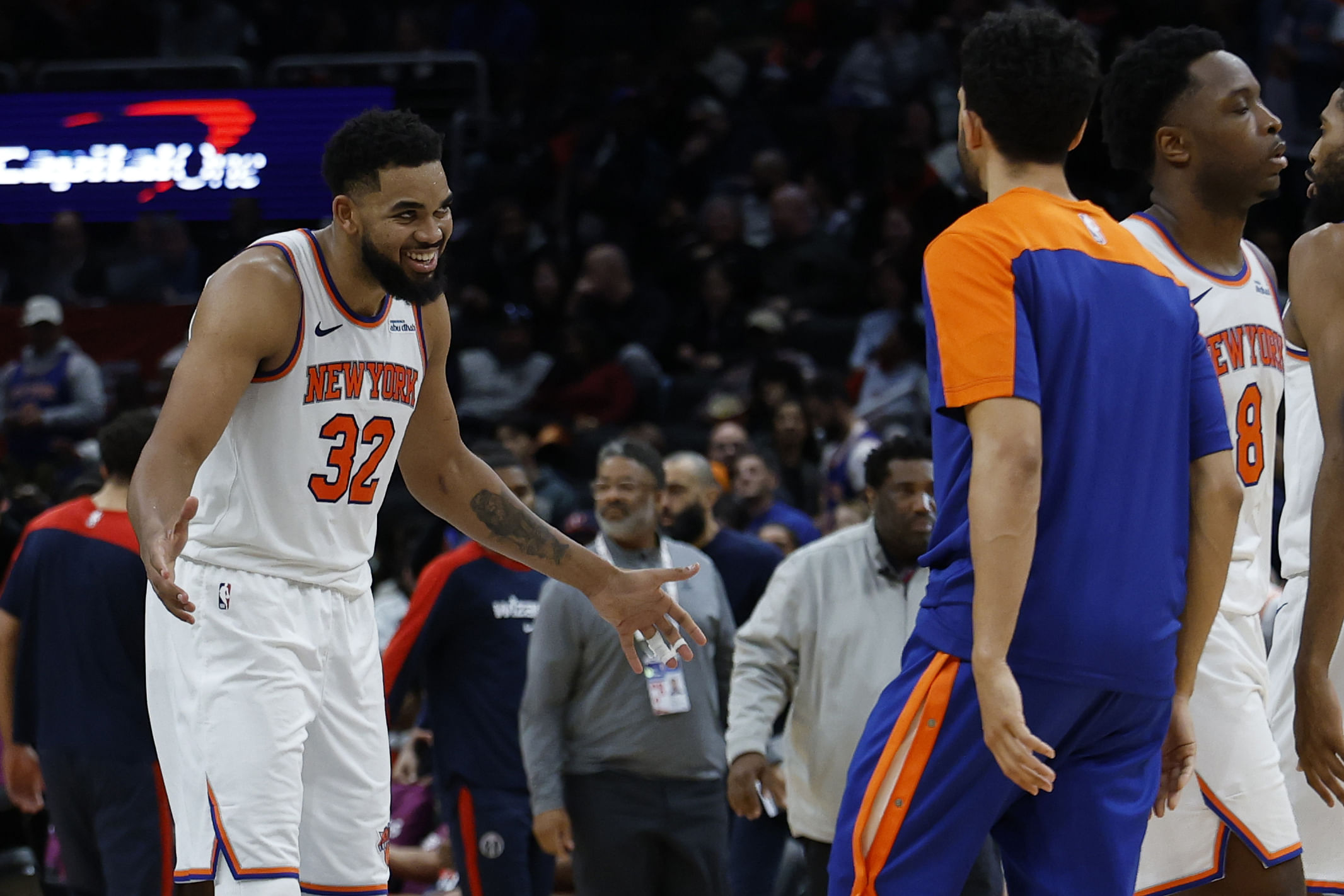 Dec 28, 2024; Washington, District of Columbia, USA; New York Knicks center Karl-Anthony Towns (32) reacts against the Washington Wizards in the fourth quarter at Capital One Arena. Mandatory Credit: Geoff Burke-Imagn Images - Source: Imagn