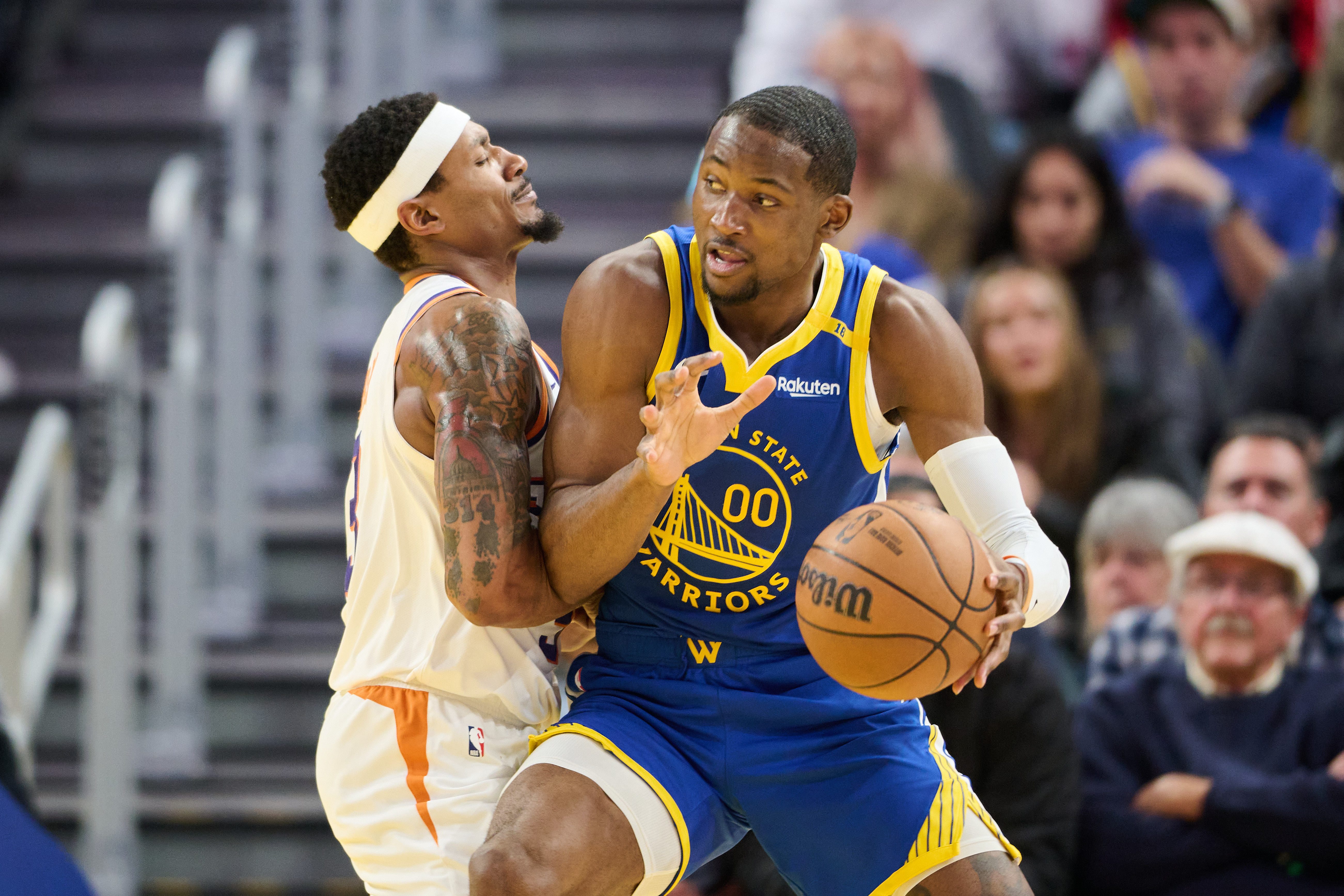 Phoenix Suns guard Bradley Beal defends against Golden State Warriors forward Jonathan Kuminga at Chase Center. Photo Credit: Imagn