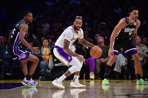 D'Angelo Russell (1) moves the ball against Sacramento Kings guard De'Aaron Fox (5) - Source: Imagn