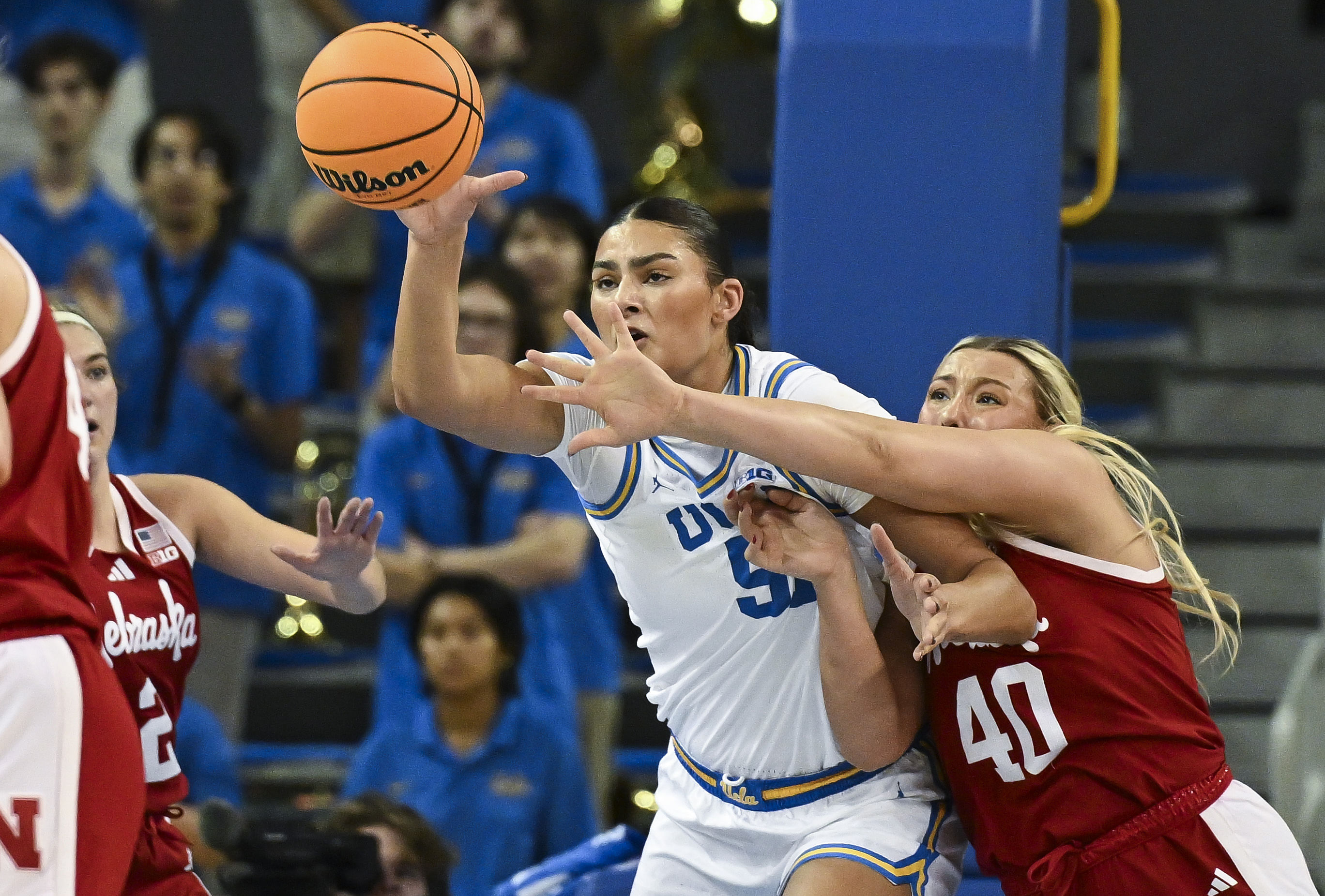 UCLA Bruins center Lauren Betts (#51) grabs a pass as Nebraska Cornhuskers center Alexis Markowski (40) defends during the first half of their NCAA game at Pauley Pavilion. Photo: Imagn