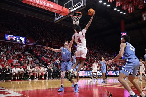 Rutgers Scarlet Knights guard Ace Bailey (#4) makes a basket assisted by guard Dylan Harper (#2) as Columbia Lions forward Jake Tavroff (34) defends during the second half. Photo: Imagn