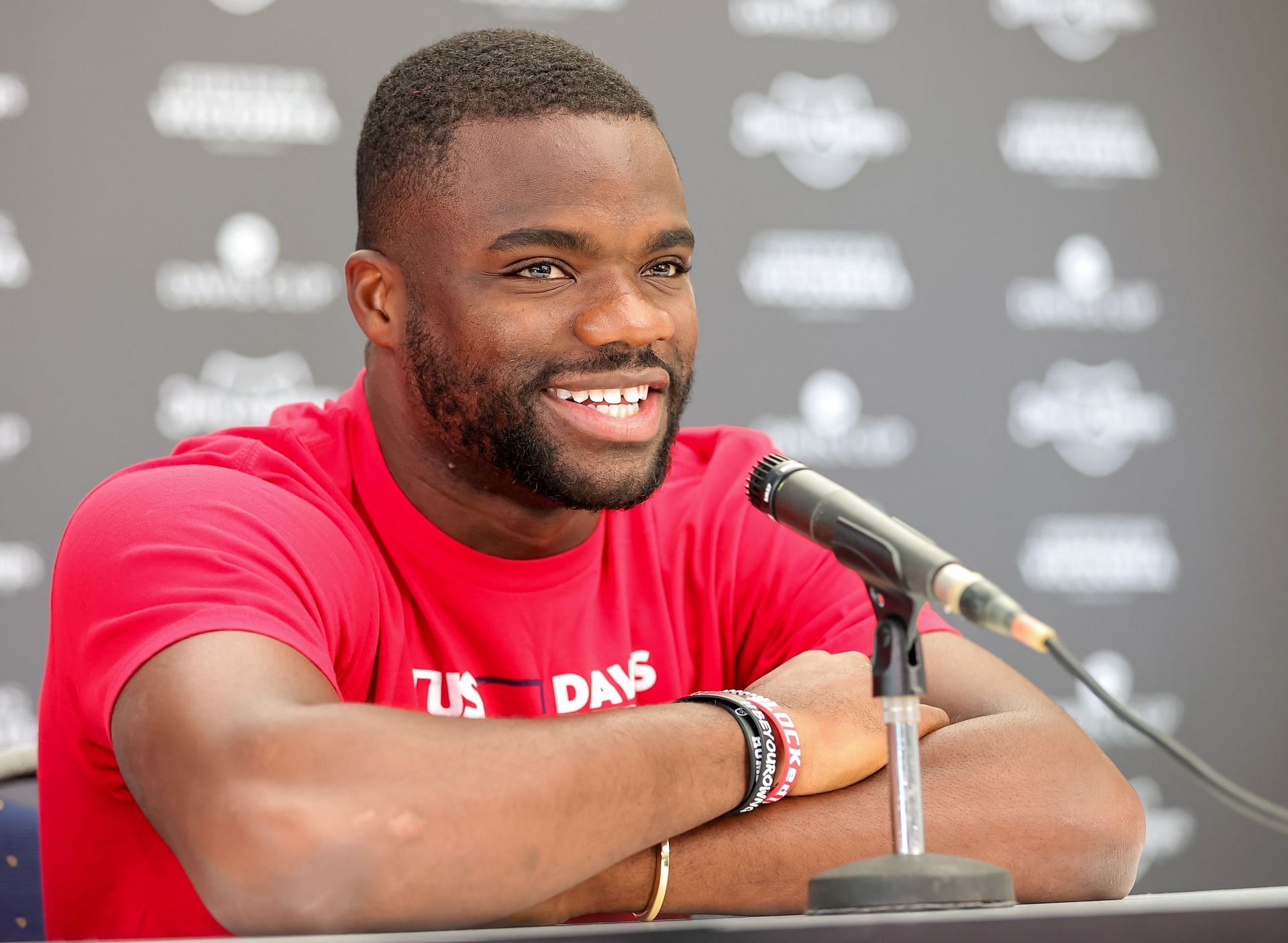 Frances Tiafoe pictured speaking to the press [Image Source: Getty Images]