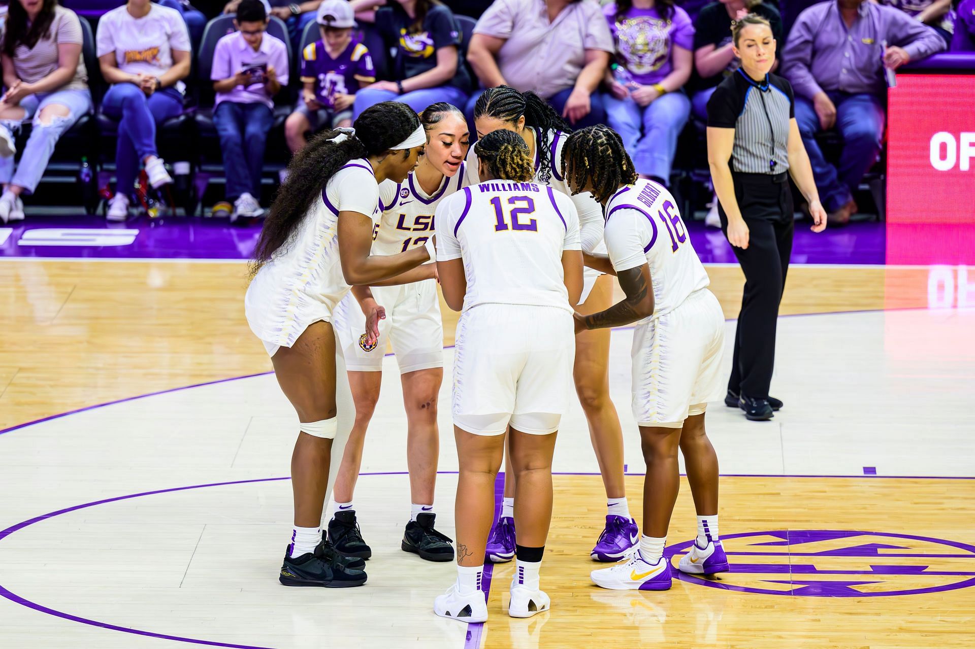 The LSU Tigers huddle against the Louisiana Ragin' Cajuns at the Pete Maravich Assembly Center on December 15, 2024 in Baton Rouge, Louisiana. Photo: Getty