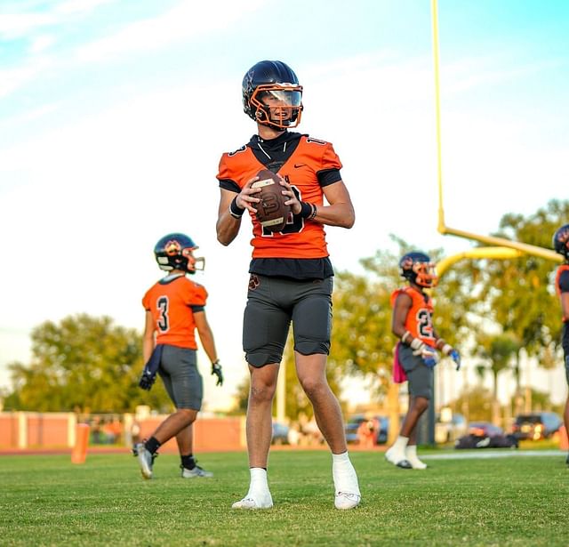 Cocoa High School Brady Hart #13 during a game. Image via @BradyHartQB on X 