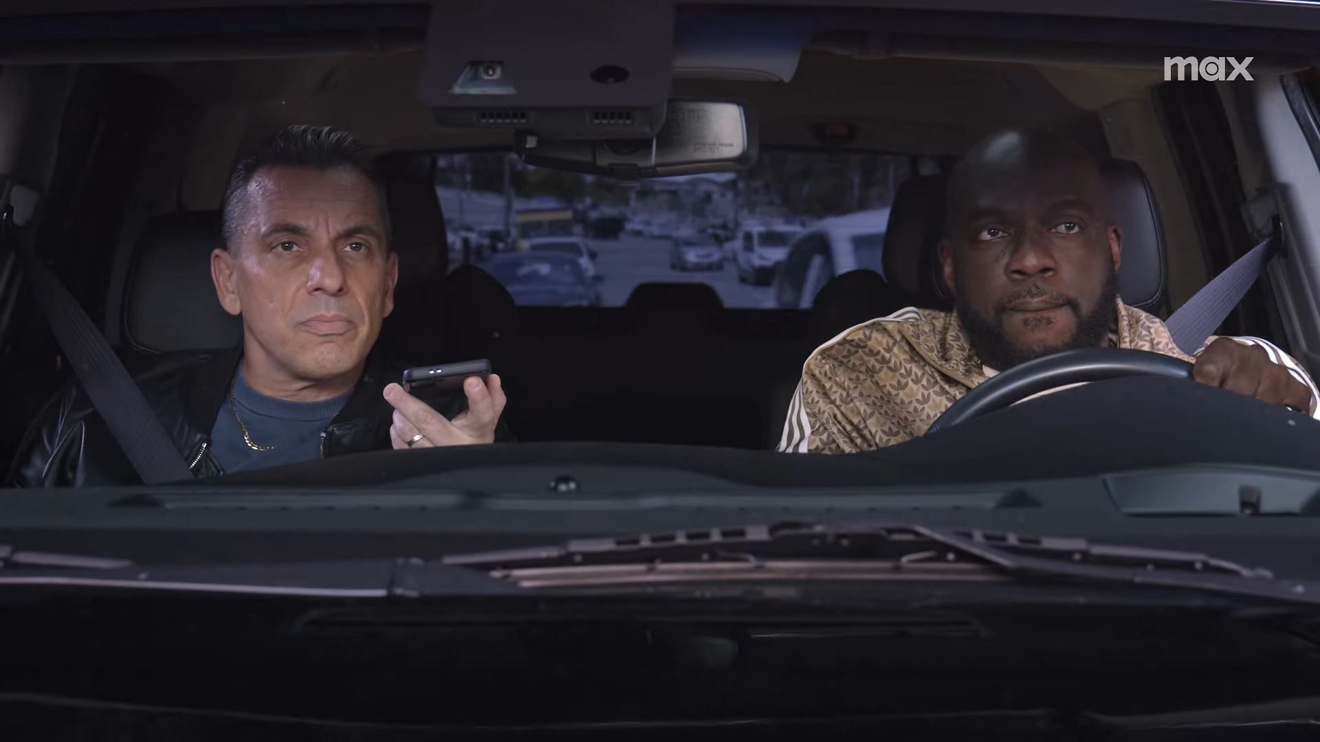 A still of actors Sebastian Maniscalco and Omar Dorsey as Danny and Ray from season 2 of Bookie (Image via Max / YouTube)