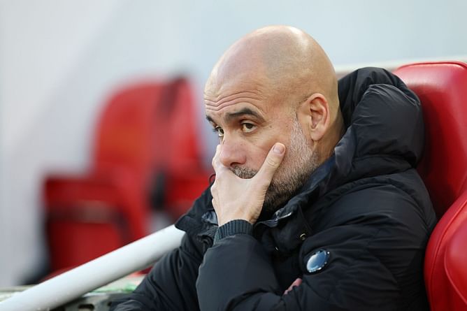 Manchester City boss Pep Guardiola responds with gesture as Liverpool fans sing 'sacked in the morning' to him in PL clash