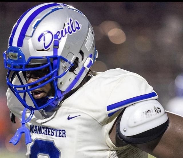 Manchester defensive linemen Justus Terry #0 during a game. Image via @JustusTerry80 on X