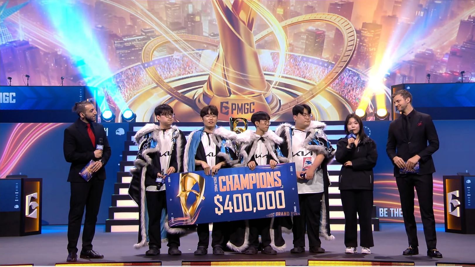 Dplus KIA lifted PMGC 2024 trophy (Image via YouTube/PUBG Mobile Esports)