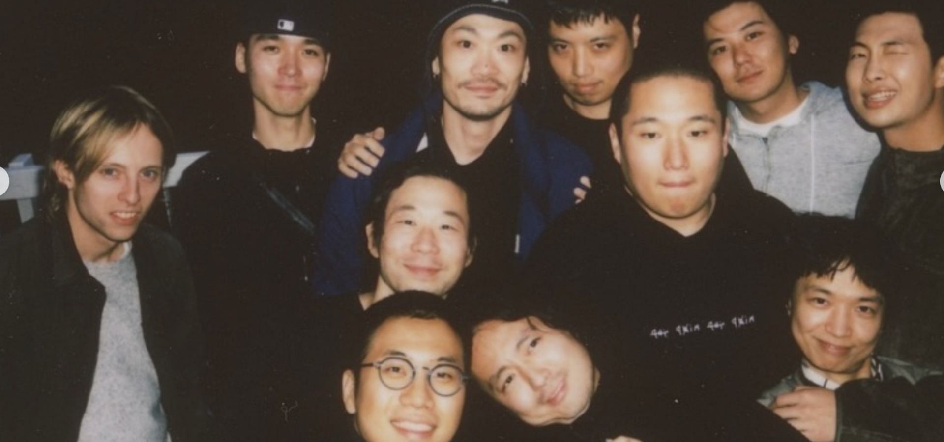 &#039;RM: Right Place, Wrong Person&rsquo; documentary team photo with the BTS leader. (Image via Instagram/@rkive)