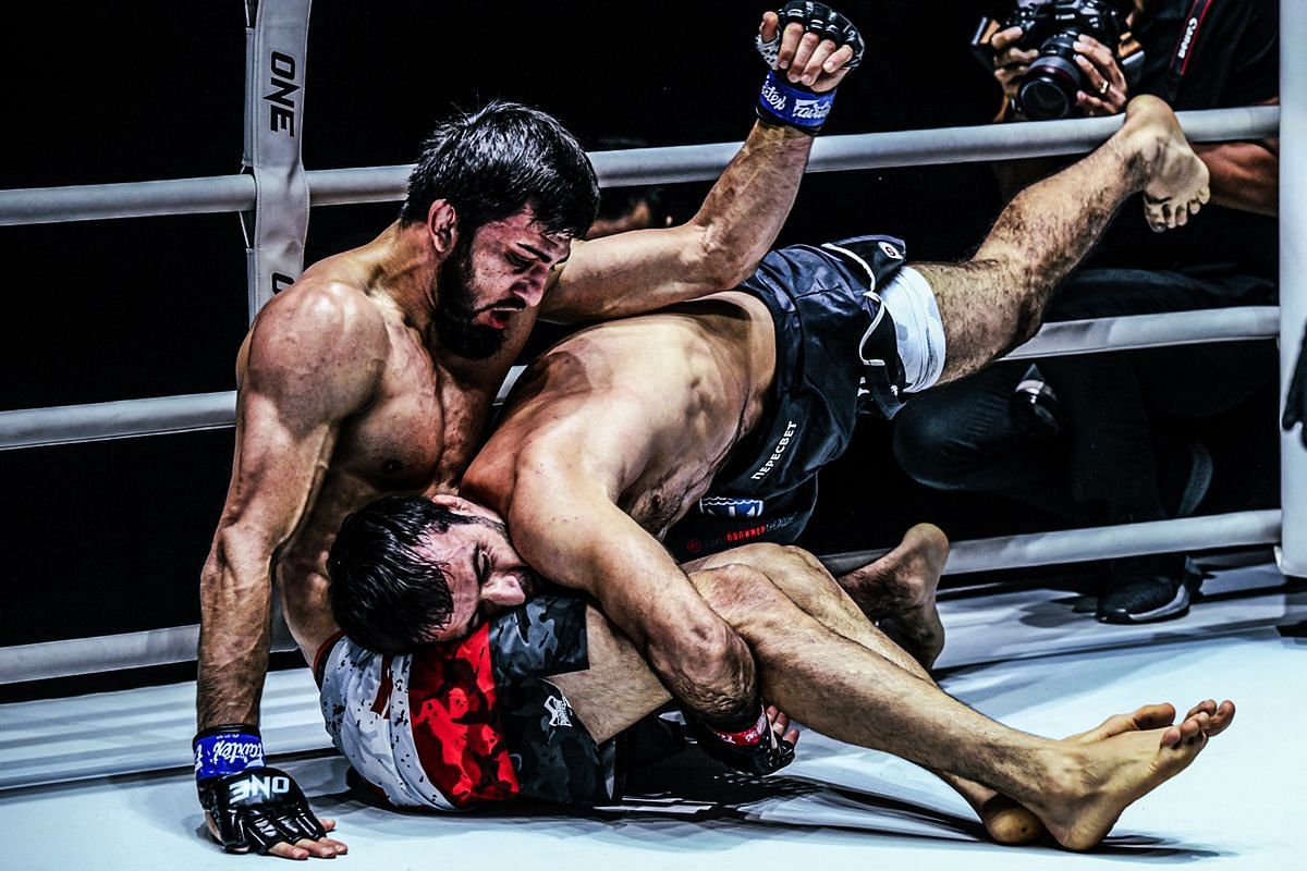 Shamil Gasanov lands a takedown against Halil Amir. [Photo from ONE Championship]