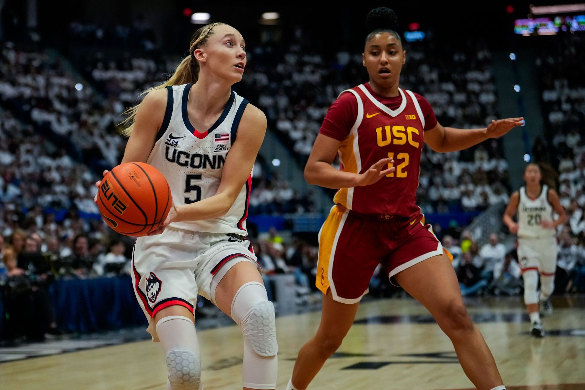 Paige Bueckers (#5) of the Connecticut Huskies is defended by JuJu Watkins (#12) of the USC Trojans during the first half of their NCAA game at the XL Center on December 21, 2024. Photo: Getty