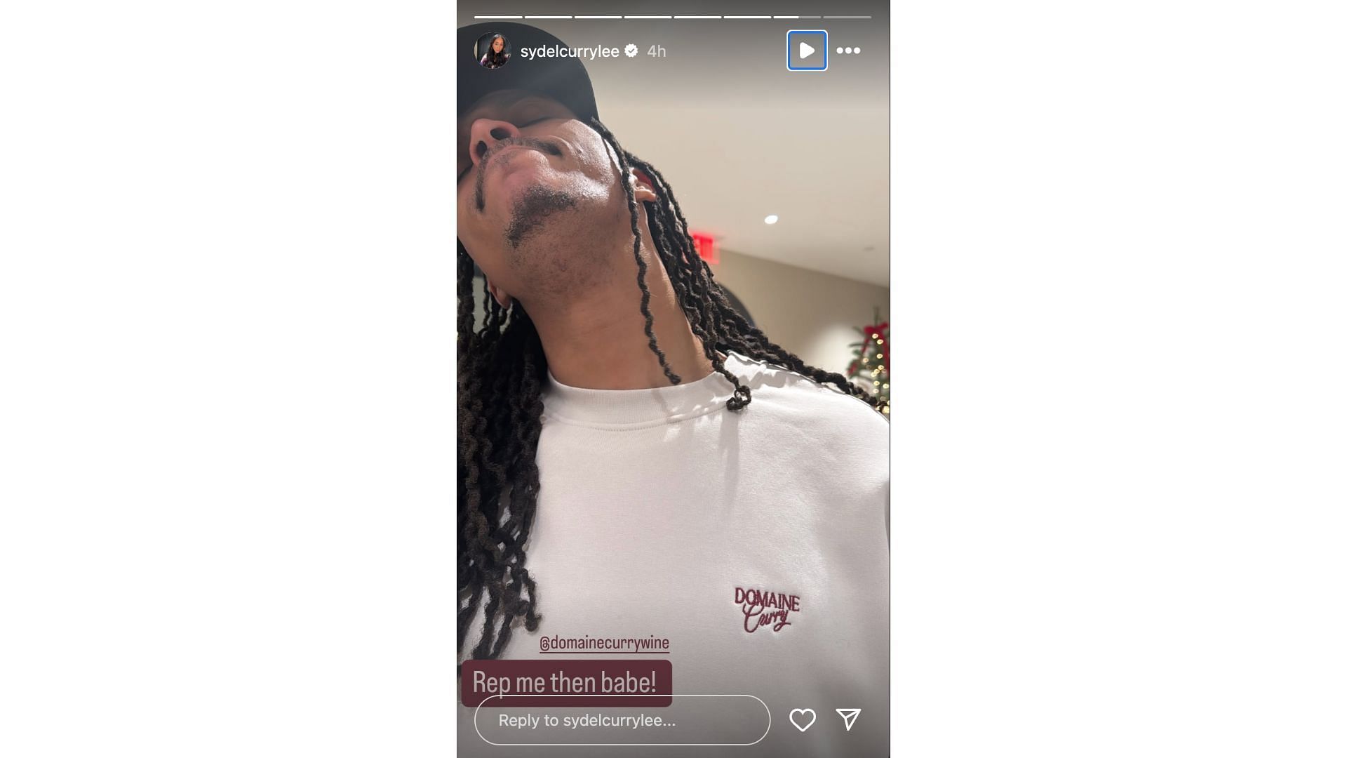 Sydel Curry-Lee reacts to husband Damion Lee rocking a Domaine Curry wines t-shirt. Photo Credits: Curry-Lee&#039;s IG account