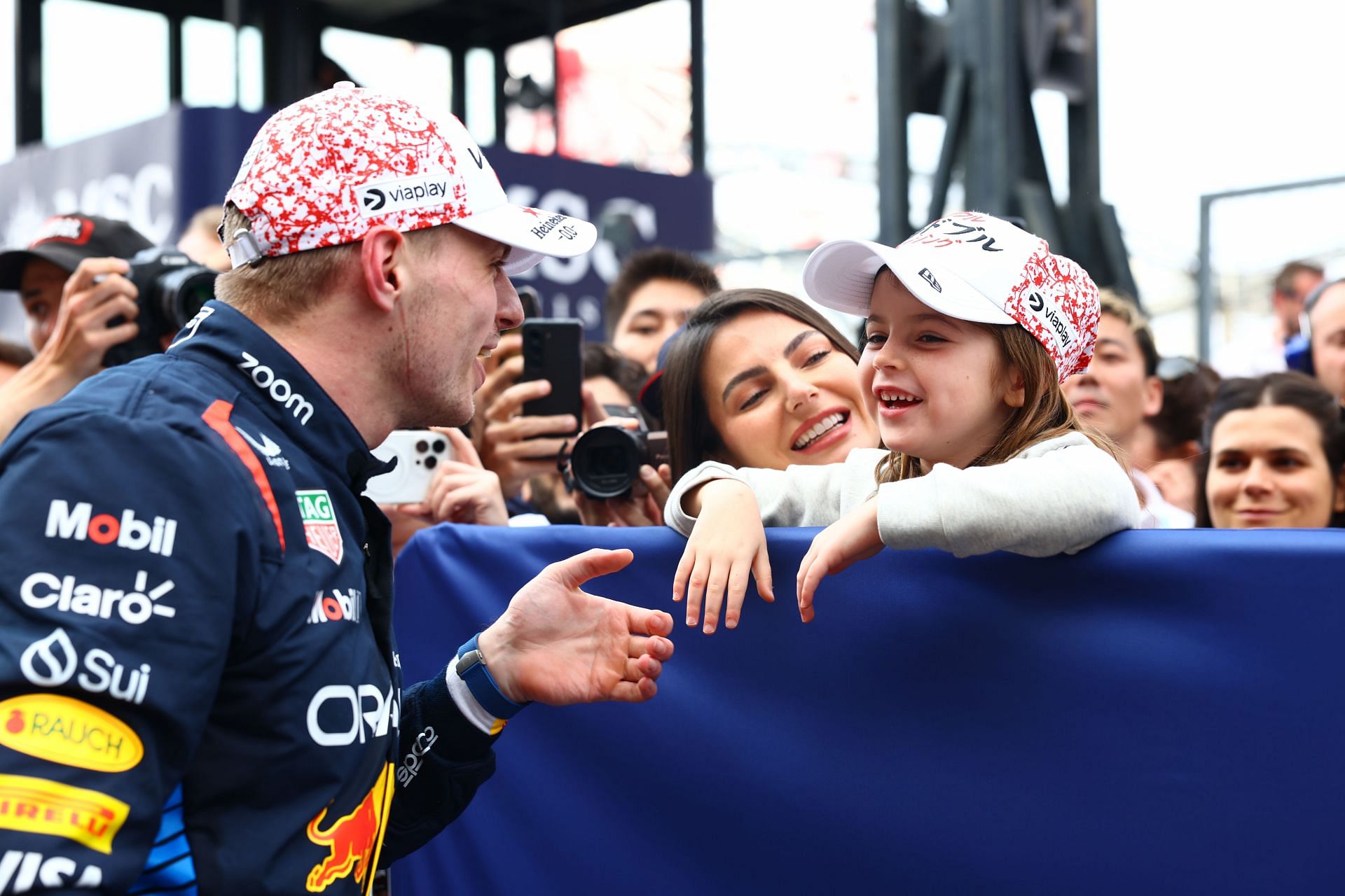 Penelope Kvyat with Max Verstappen at F1 Grand Prix of Japan (Image Source: Getty)