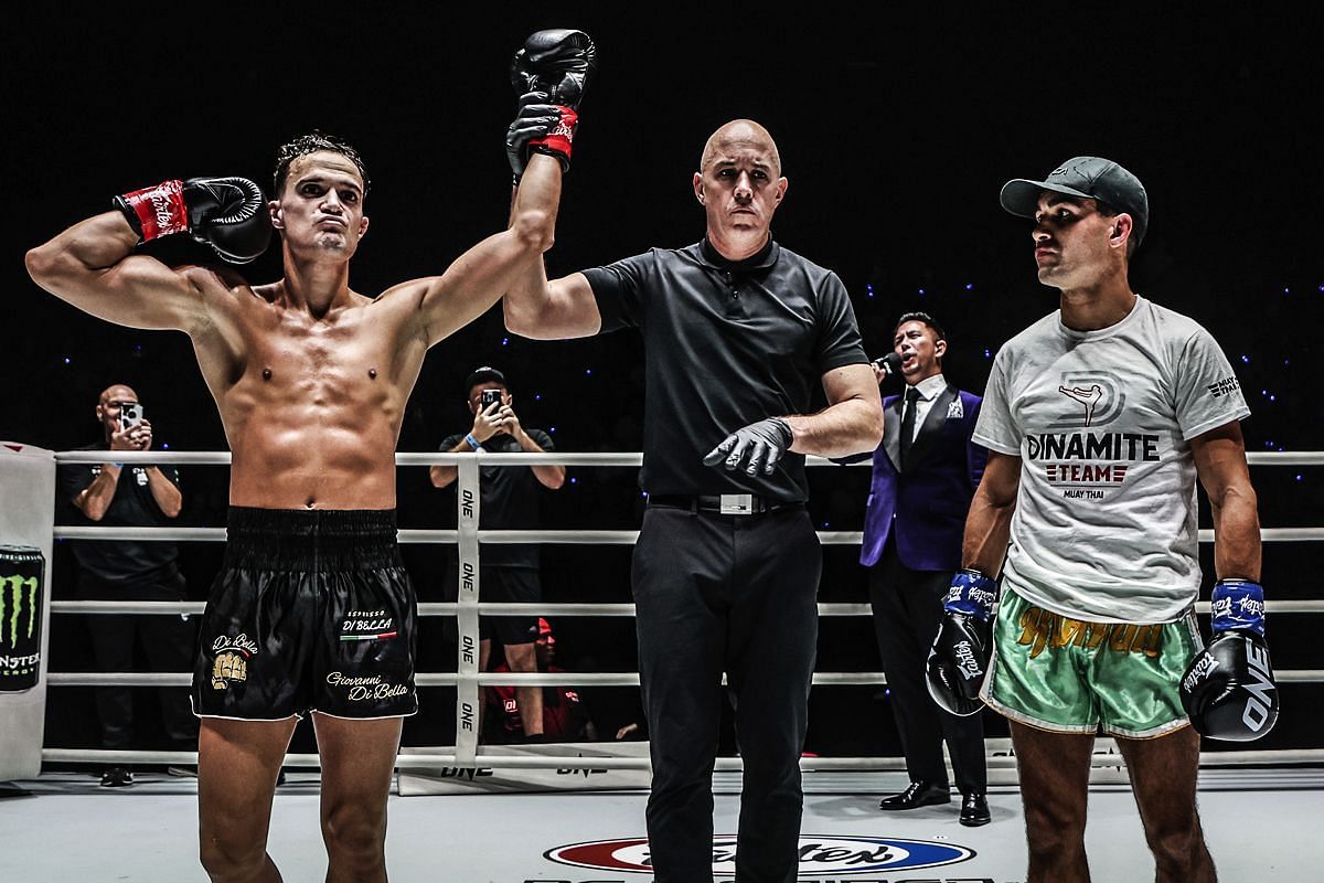 Jonathan Di Bella (L) flexes after beating Rui Botelho | Photo by ONE Championship