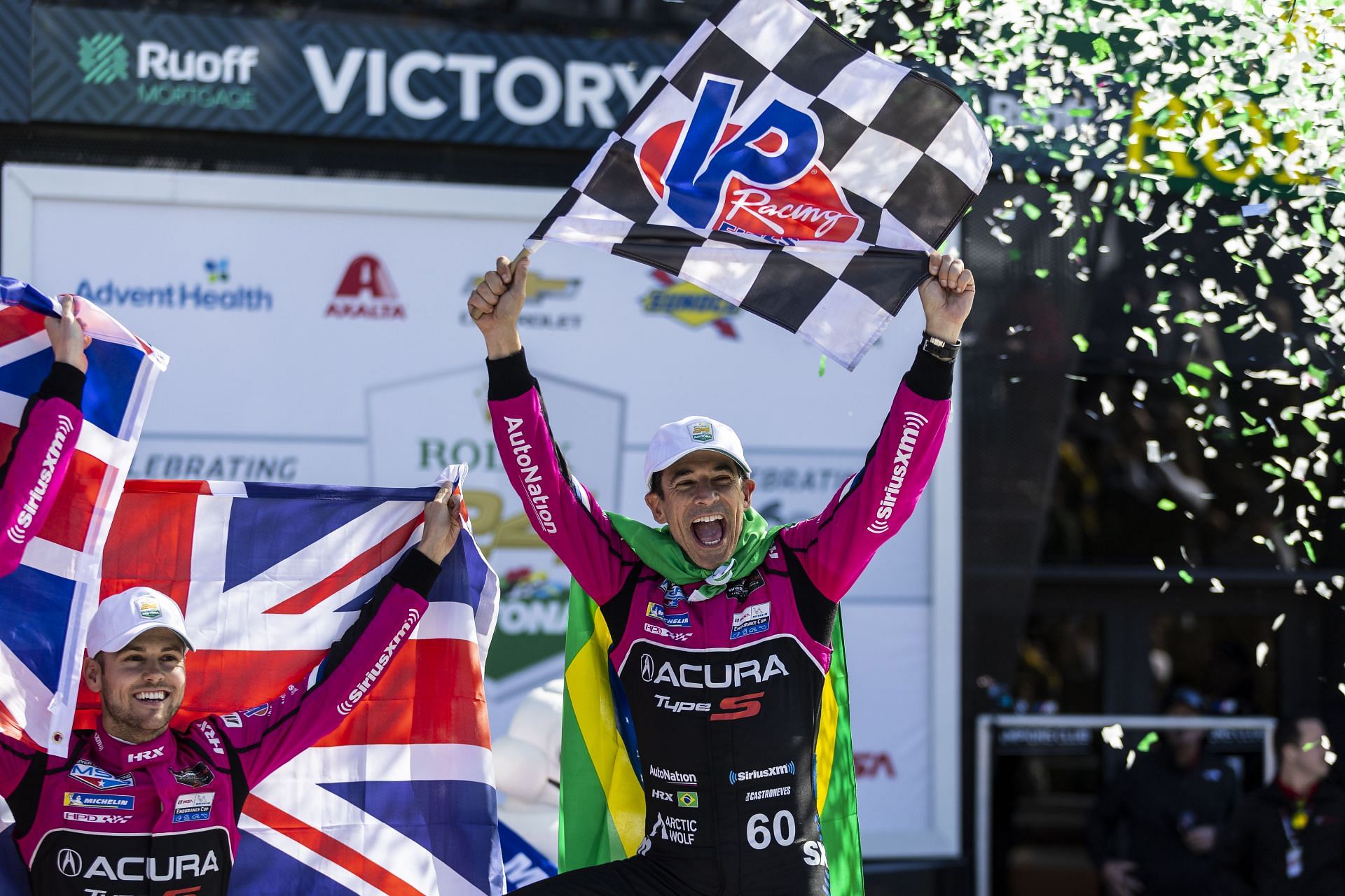 Helio Castroneves celebrates after winning the Rolex 24 at Daytona International Speedway - Source: Getty