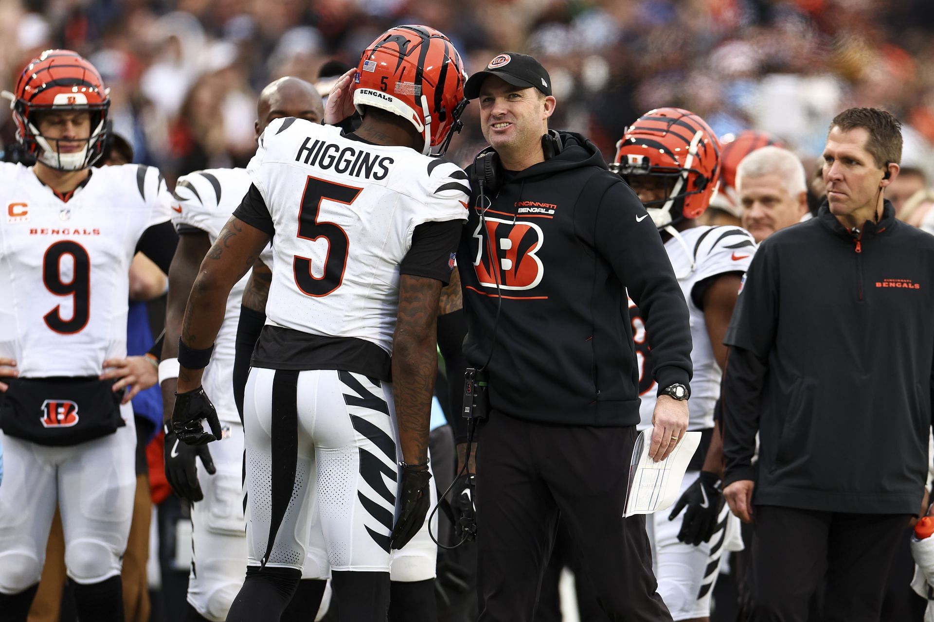 Tee Higgins, left, and Bengals coach Zac Taylor, right, during Cincinnati Bengals v Tennessee TItans - Source: Getty