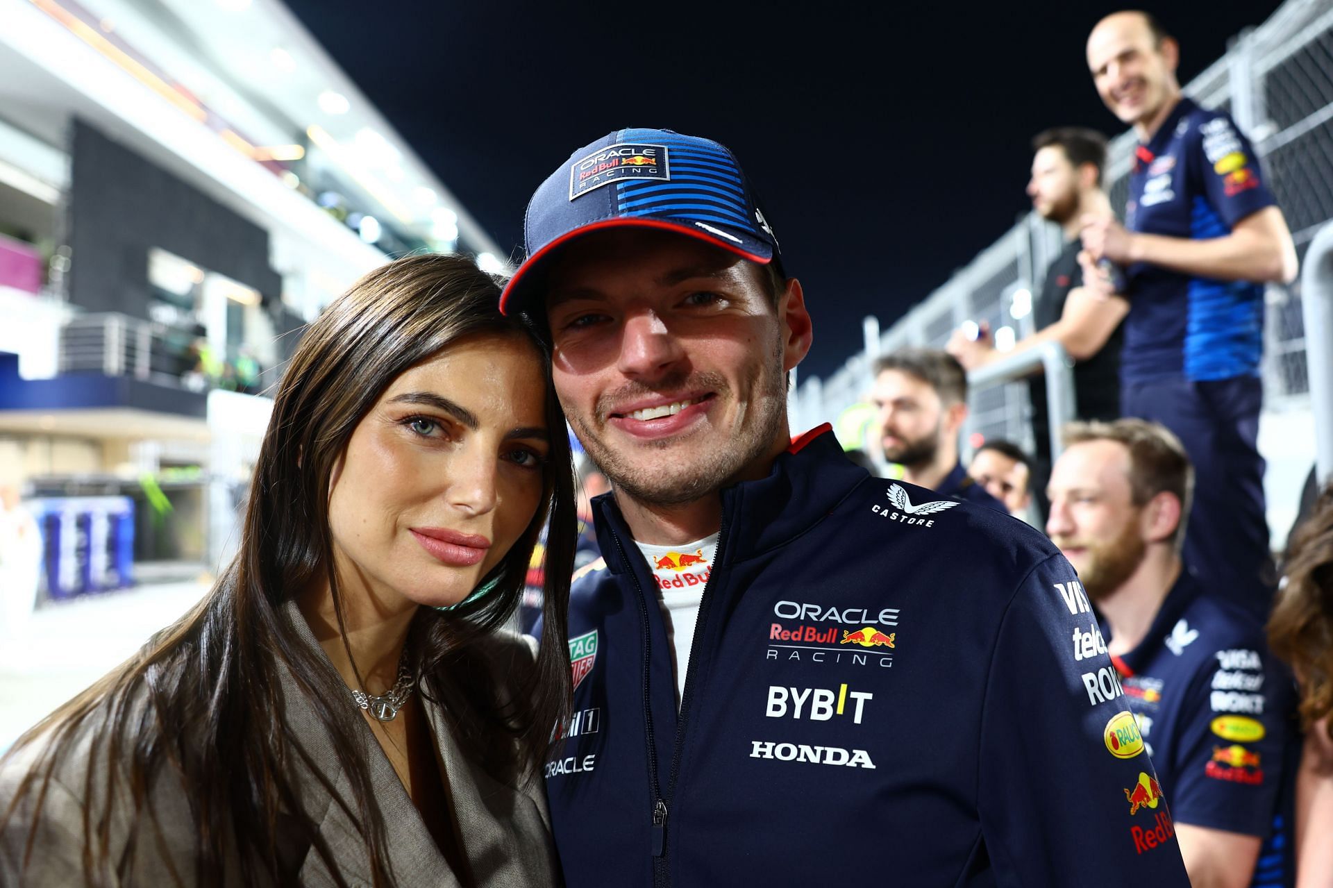 Kelly Piquet (L) and race winner Max Verstappen of the Netherlands pose for a photo - Source: Getty