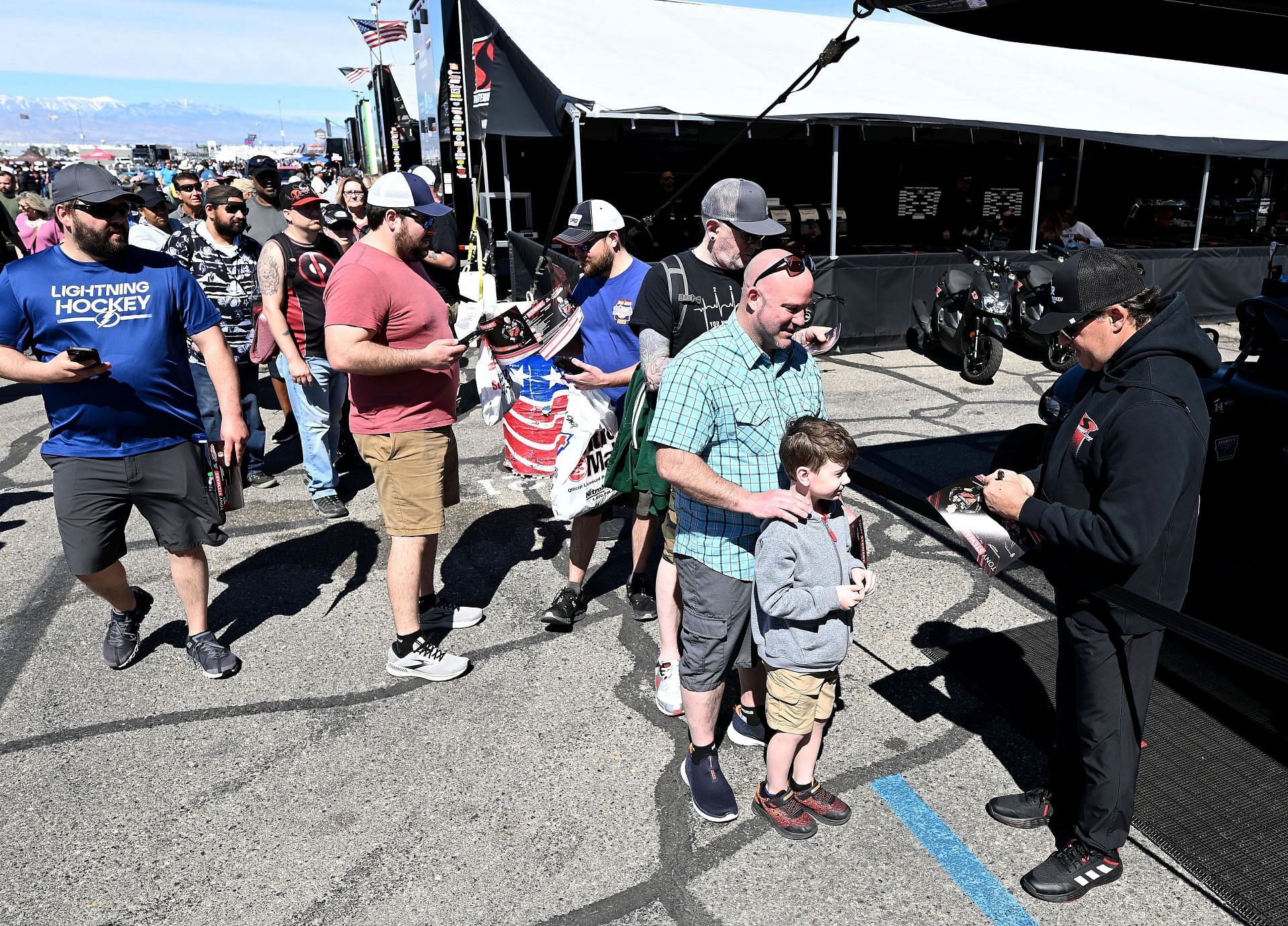 Tony Stewart greeting fans and signing autographs at the NHRA 4-Wide Nationals - Source: Getty