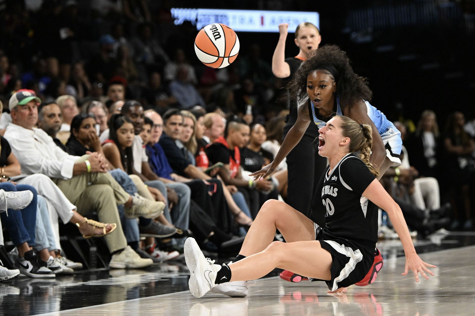 Kate Martin #20 of the Las Vegas Aces goes down with an injury against the Chicago Sky (Credits: Getty)