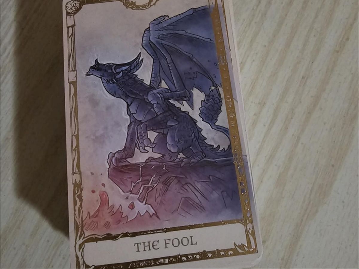 Wrathion really does fit The Fool card, I think. Plus that art is wonderful. (Image via Insight Editions/Blizzard Entertainment)