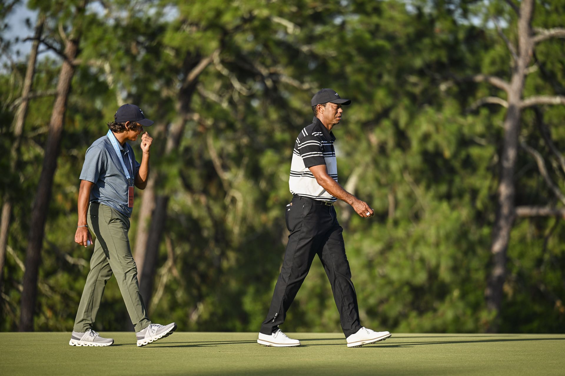 &lt;a href=&#039;https://www.sportskeeda.com/player/tiger-woods&#039; target=&#039;_blank&#039; rel=&#039;noopener noreferrer&#039;&gt;Tiger Woods&lt;/a&gt; (R) and Charlie Woods - Source: Getty Images